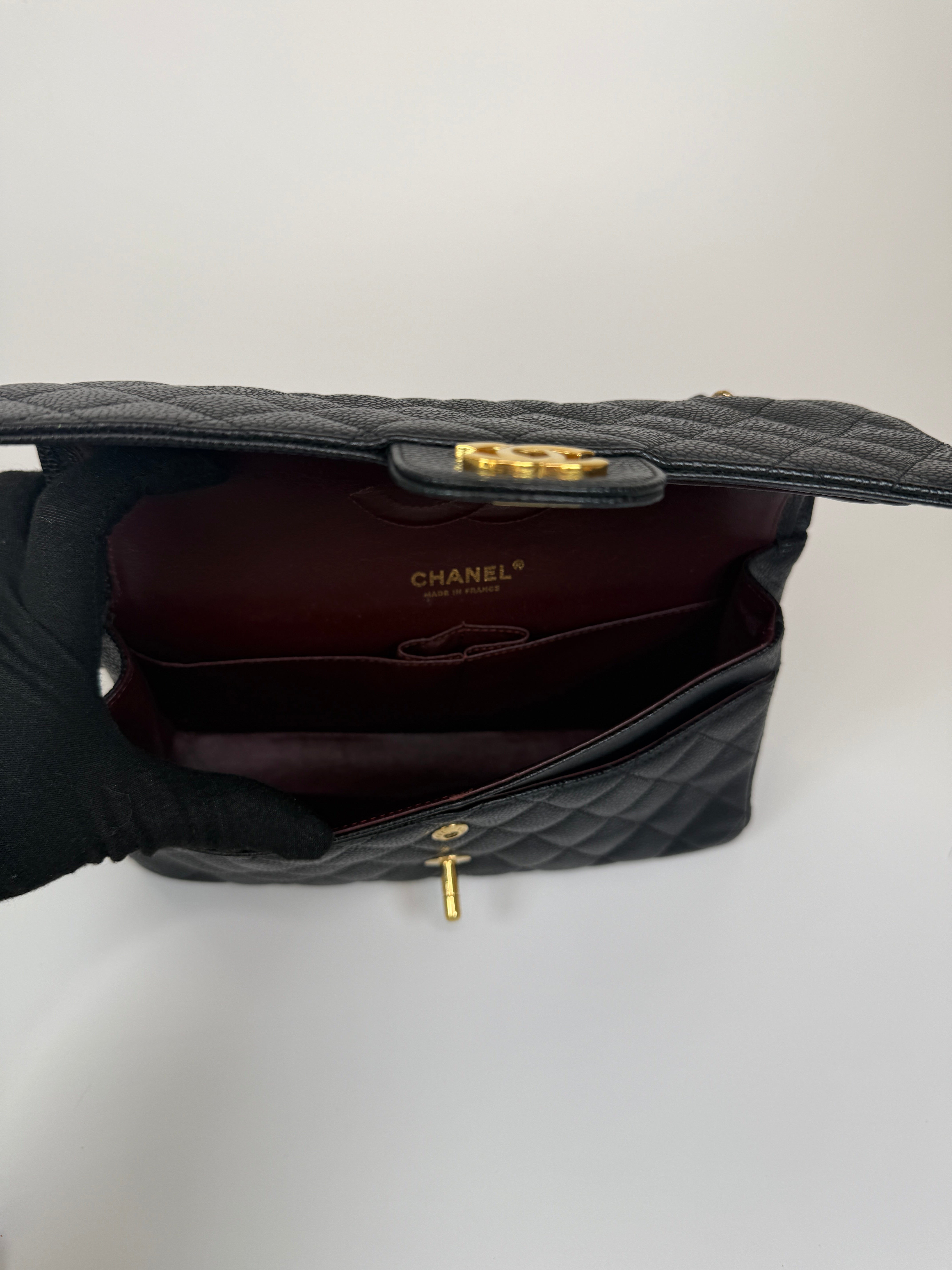 Chanel Medium Classic Double Flap Black Caviar Leather With Gold Hardware. Authentic and preloved. 100% Authenticity guarantee 