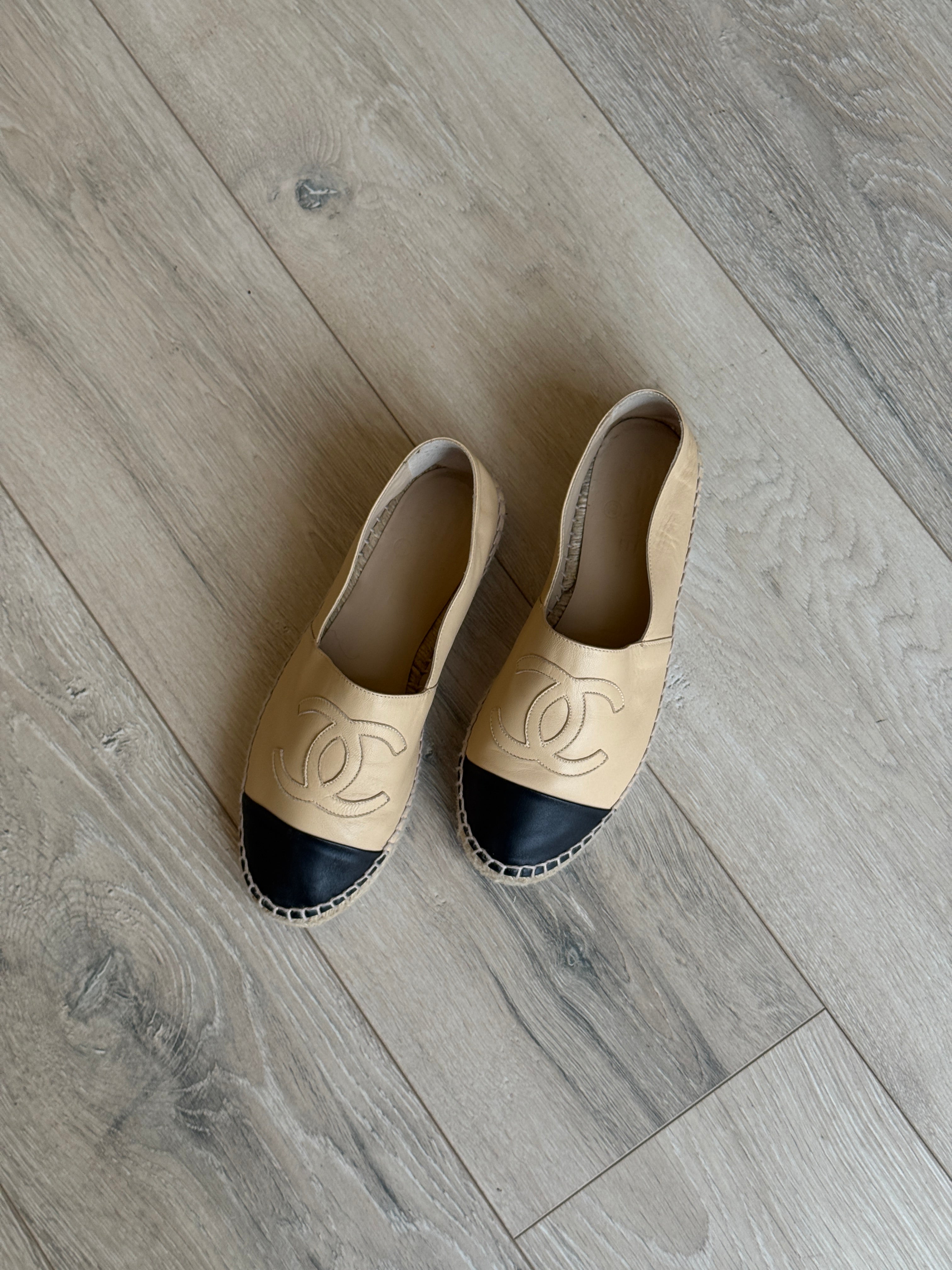 Authentic and preloved Chanel Espadrilles (Size 38/UK5) In Beige and Black Lambskin Leather. Excellent condition. 100% Authenticity guarantee
