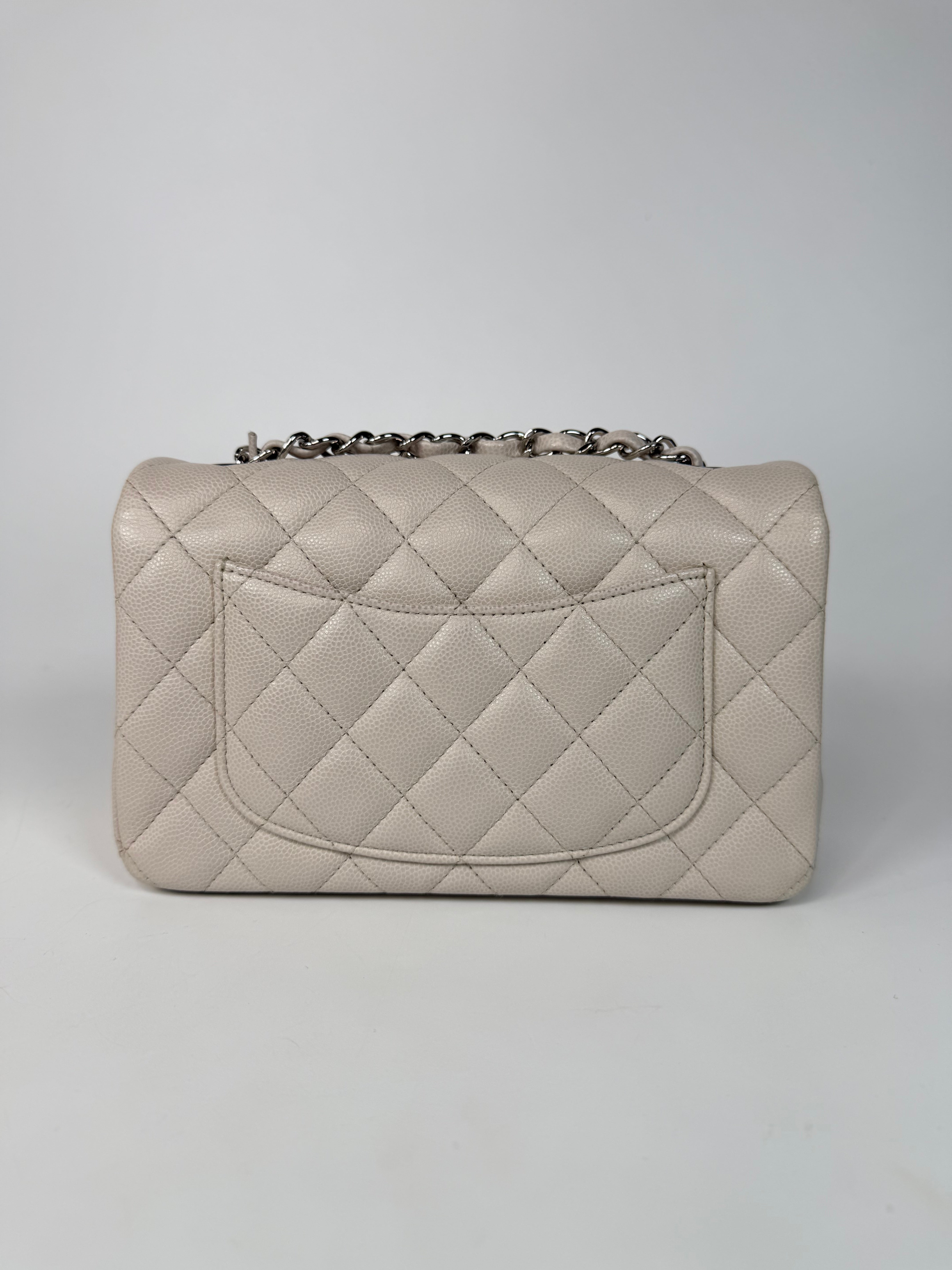 Chanel Mini Rectangle Pale Grey Caviar Leather With Silver Hardware in excellent condition 100% authentic and preloved