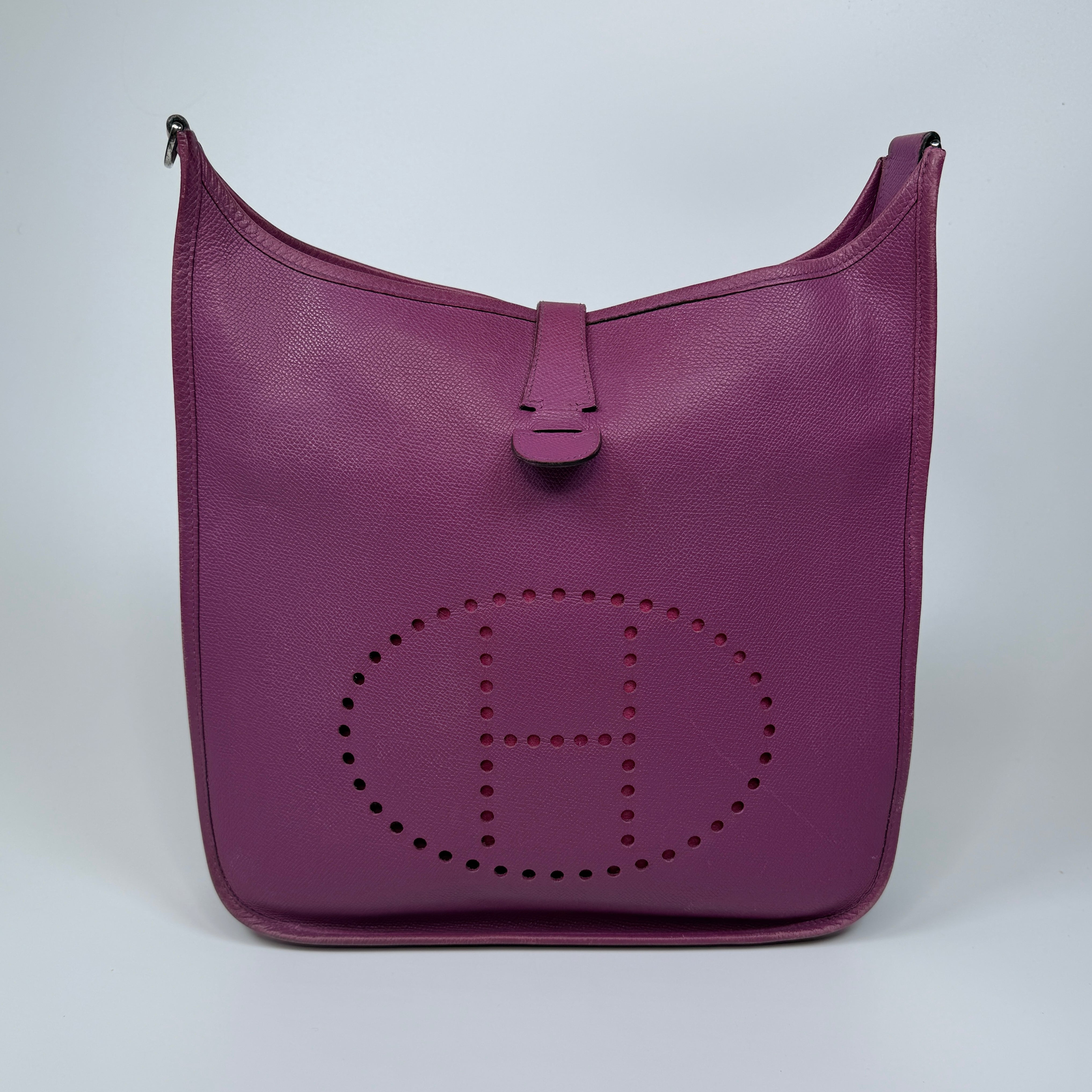 Authentic and preloved Hermès Evelyne 29 In Purple Clemence Leather With Palladium Hardware. Good Condition. 100% Authenticity Guarantee 