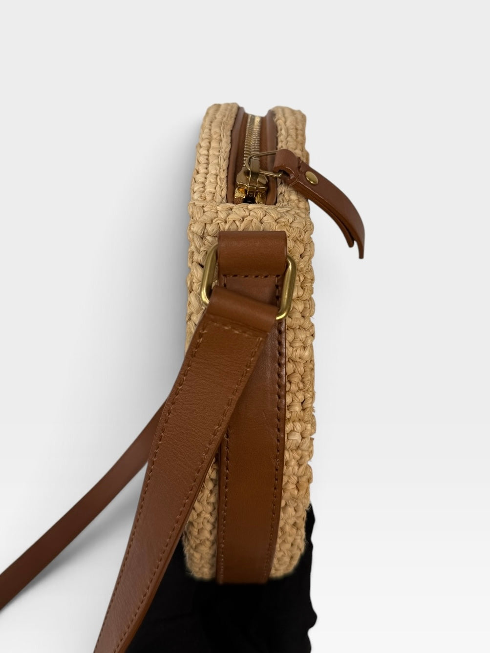 Saint Laurent Round Raffia Crossbody Bag With Gold Hardware. 100% authentic and preloved in excellent condition