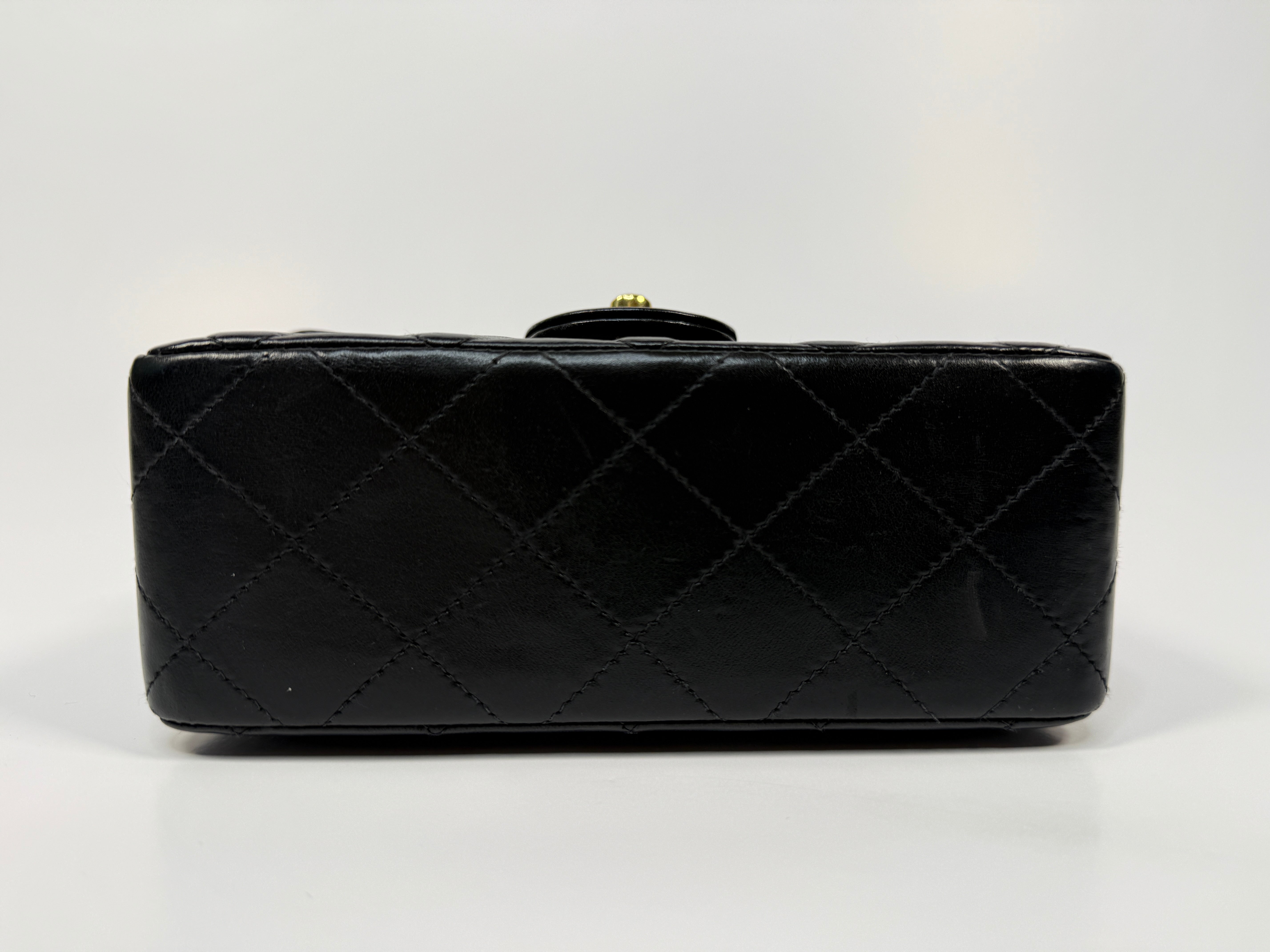 Chanel Black Square Vintage Flap Bag In Lambskin With Gold Hardware
Pre Loved & Authentic 