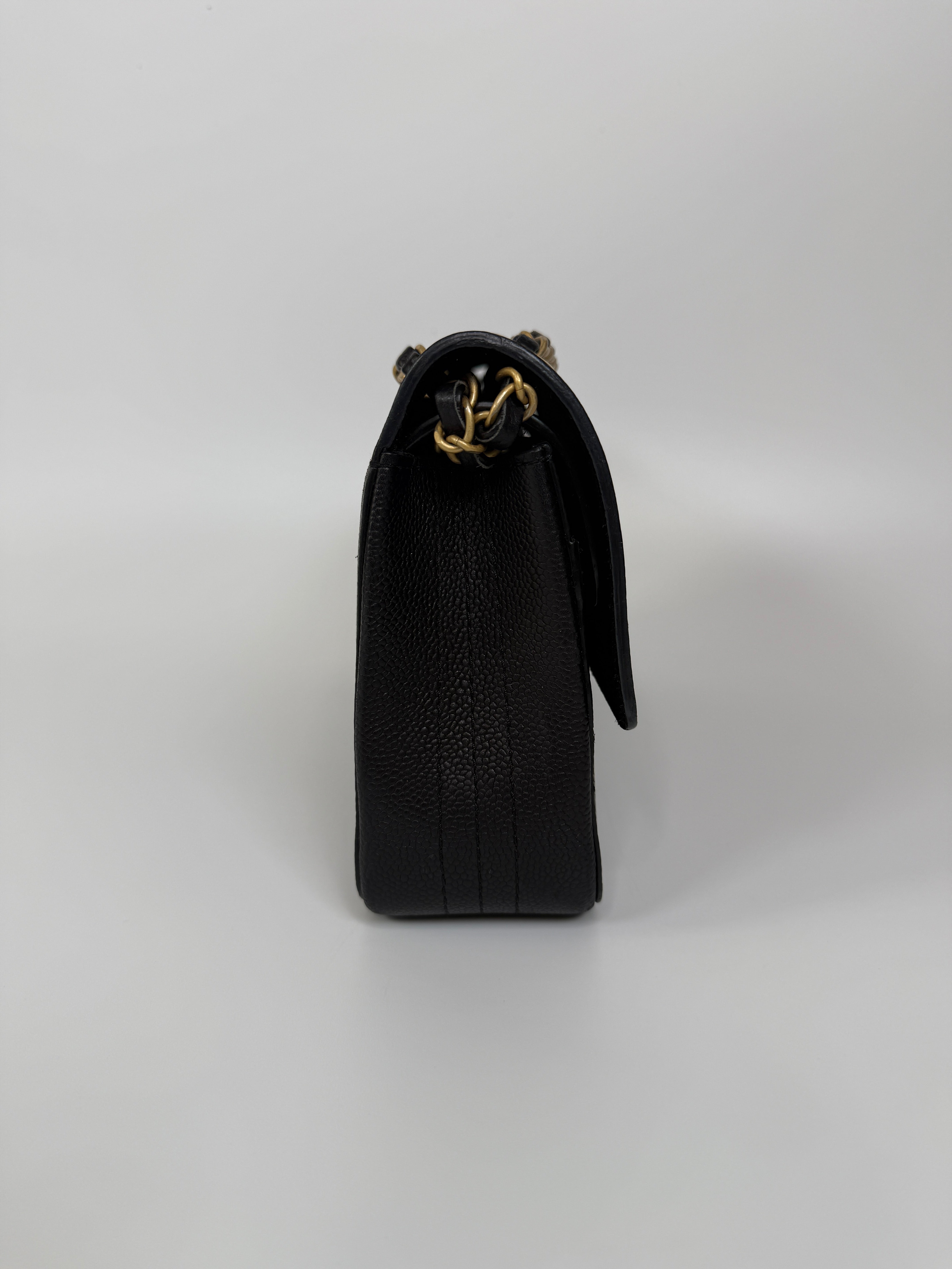 Authentic and preloved Chanel Medium Pure Timeless Flap Black In Black Caviar Leather With Gold Hardware. 100% Authenticity Guarantee 