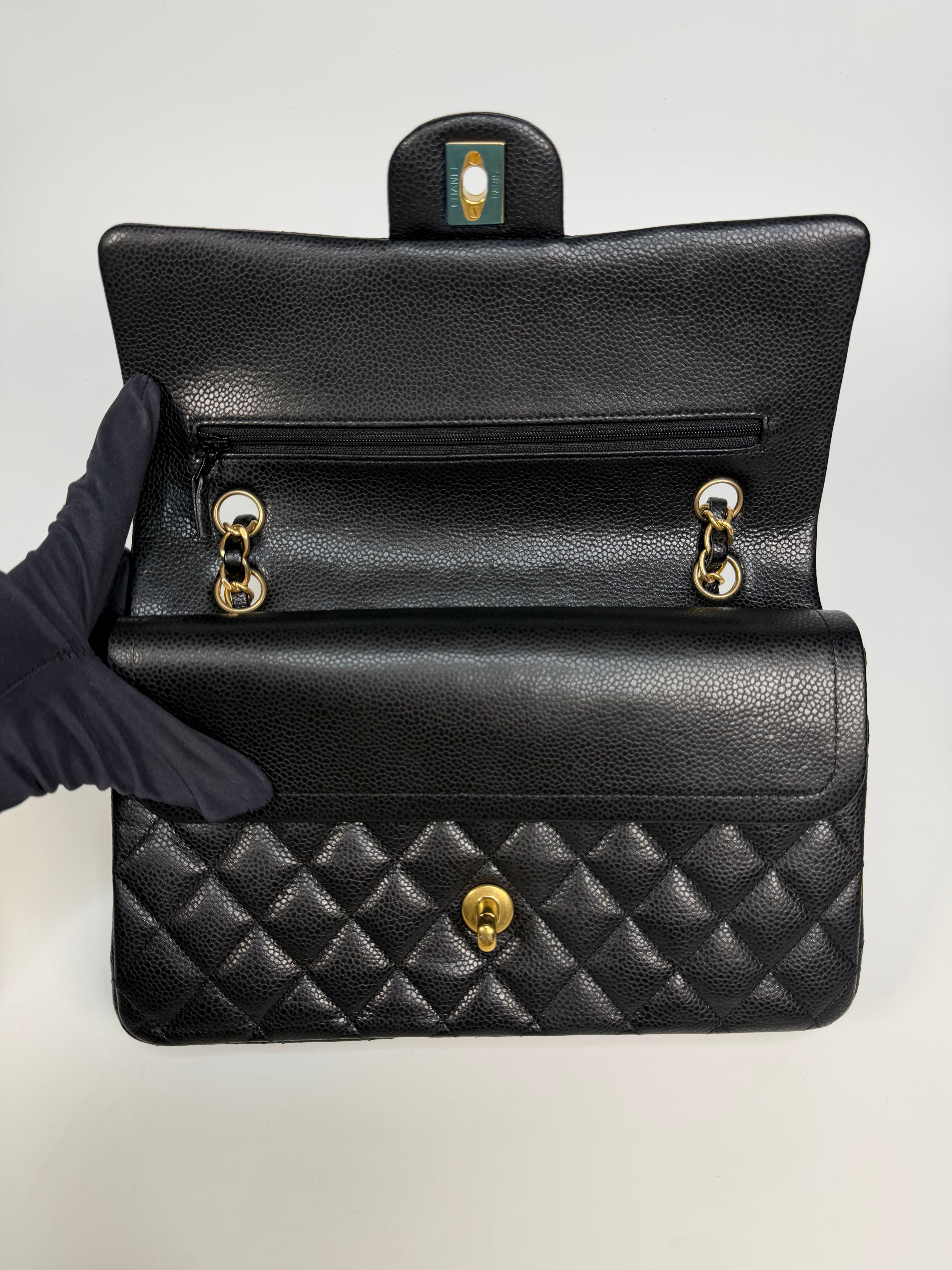 Chanel Medium Classic Double Flap Black Caviar Leather With Gold Hardware. Authentic and preloved in excellent condition