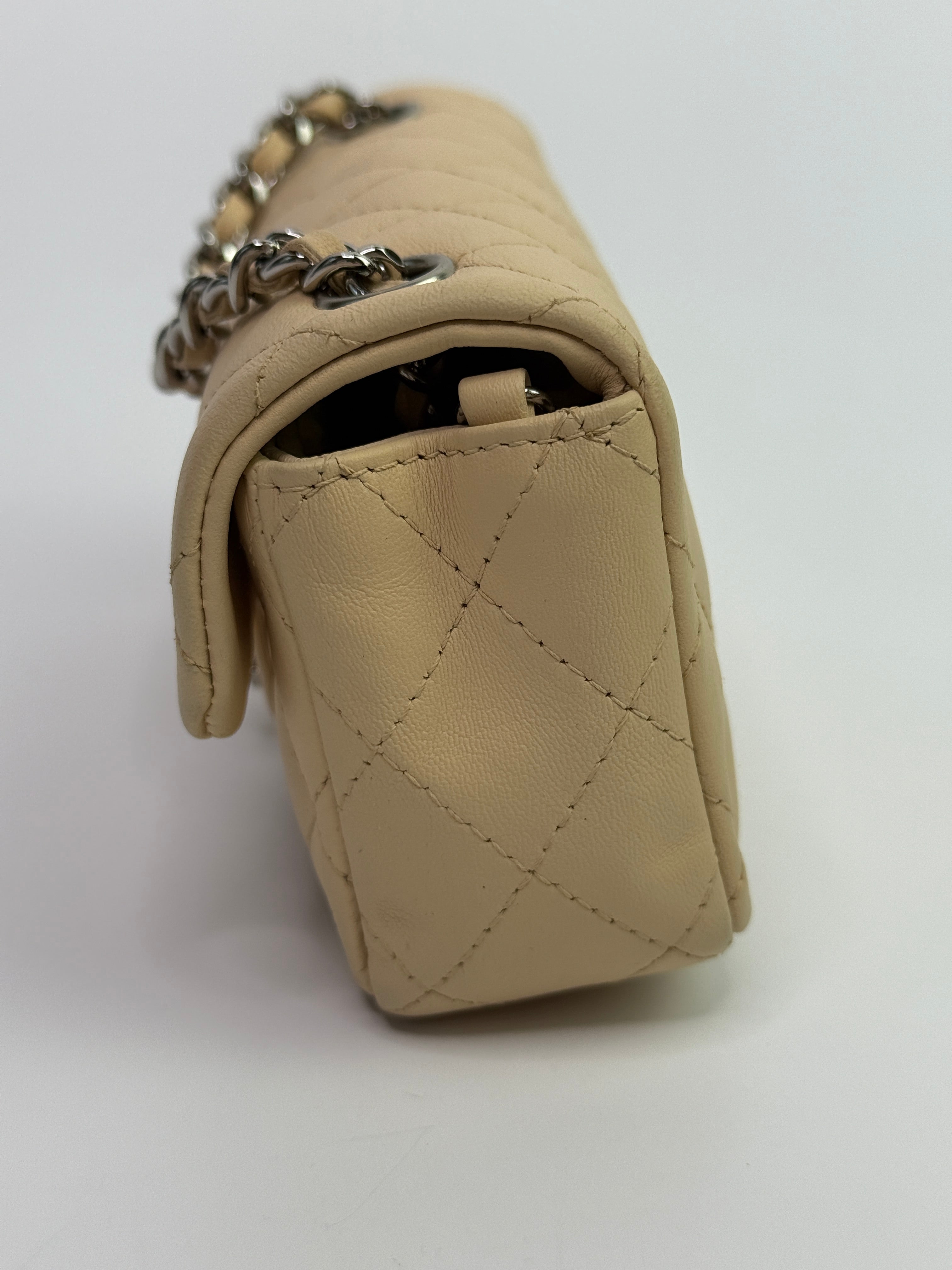 Chanel Super Mini Classic Flap Bag In Beige Lambskin With SHW