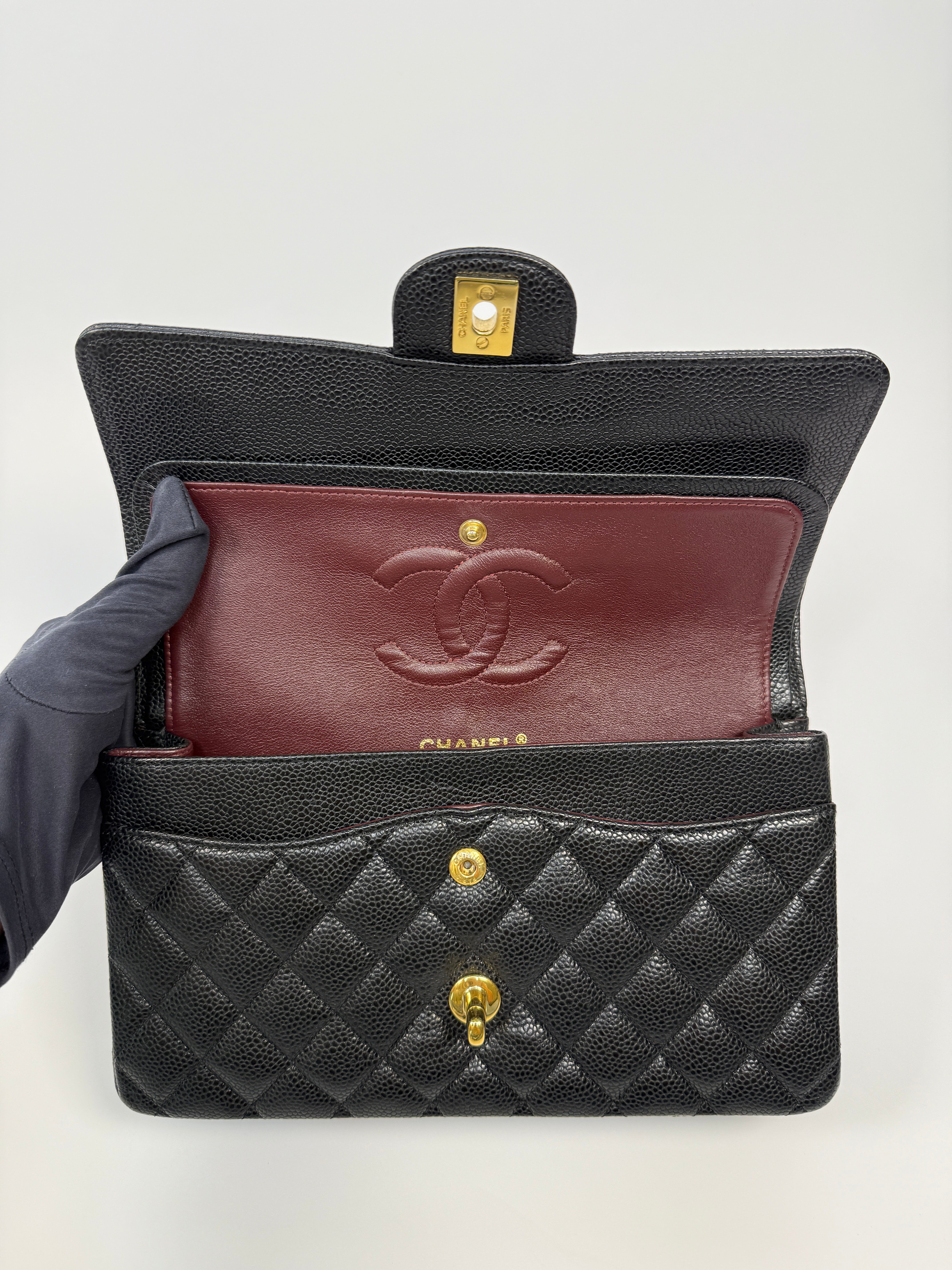 Chanel Medium Classic Double Flap Black CaviarWith Gold Hardware
Pre Loved & Authentic 