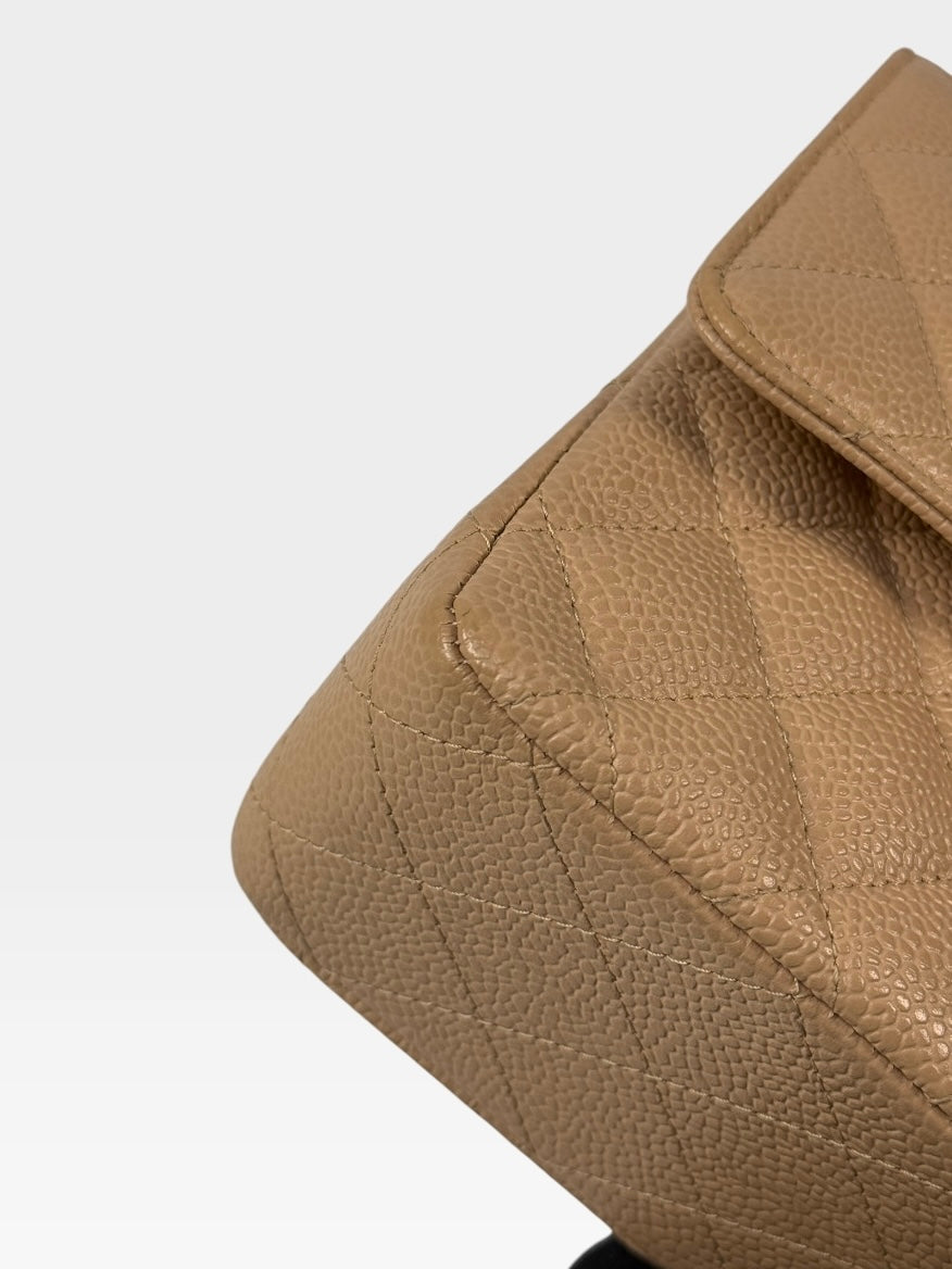 Chanel Medium Classic Flap In Beige Caviar Leather With Gold Hardware. 100% authentic and preloved in excellent condition