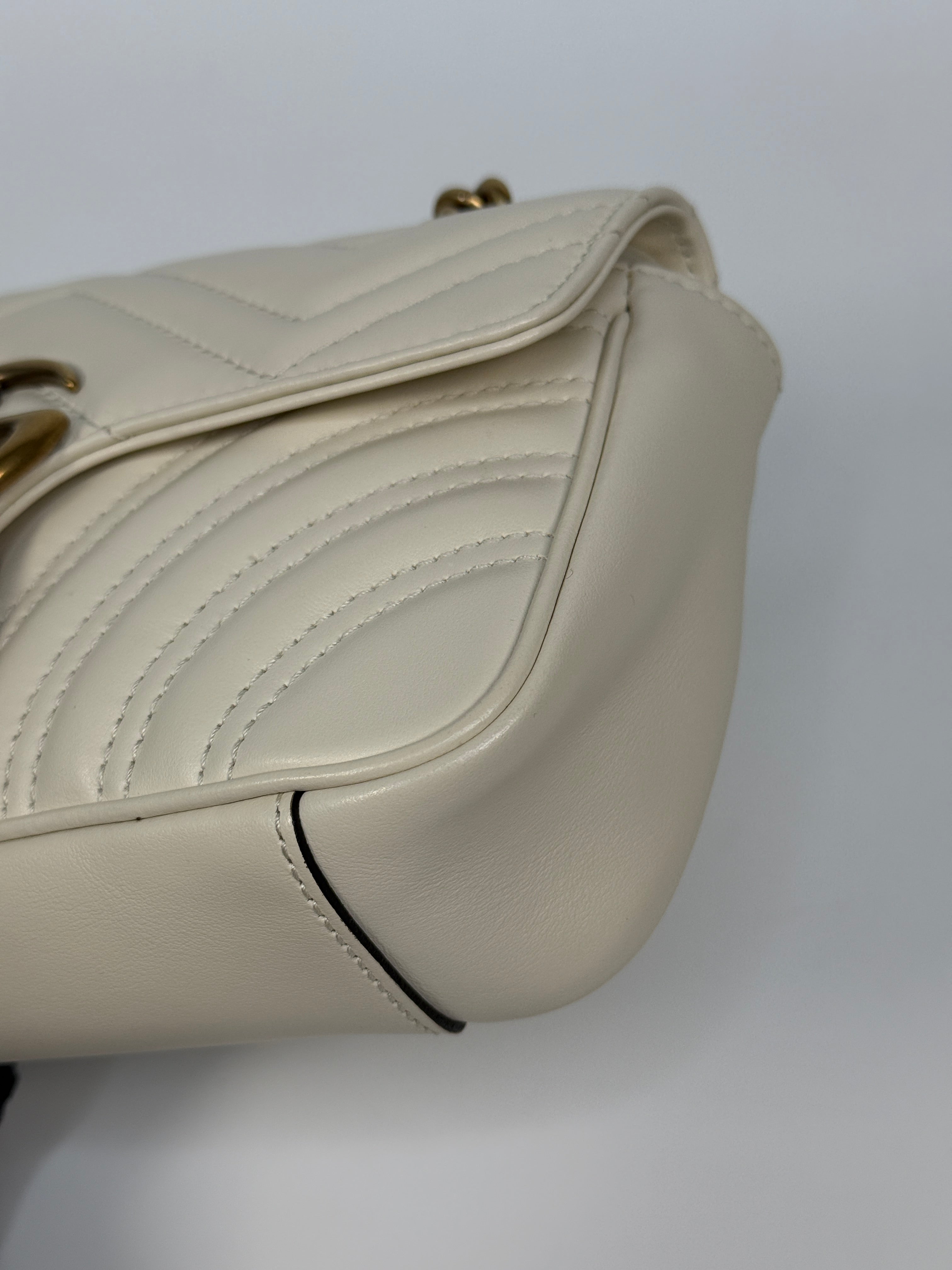 Gucci GG Small Marmont Matelasse Shoulder Bag In Ivory Leather With Gold Hardware 