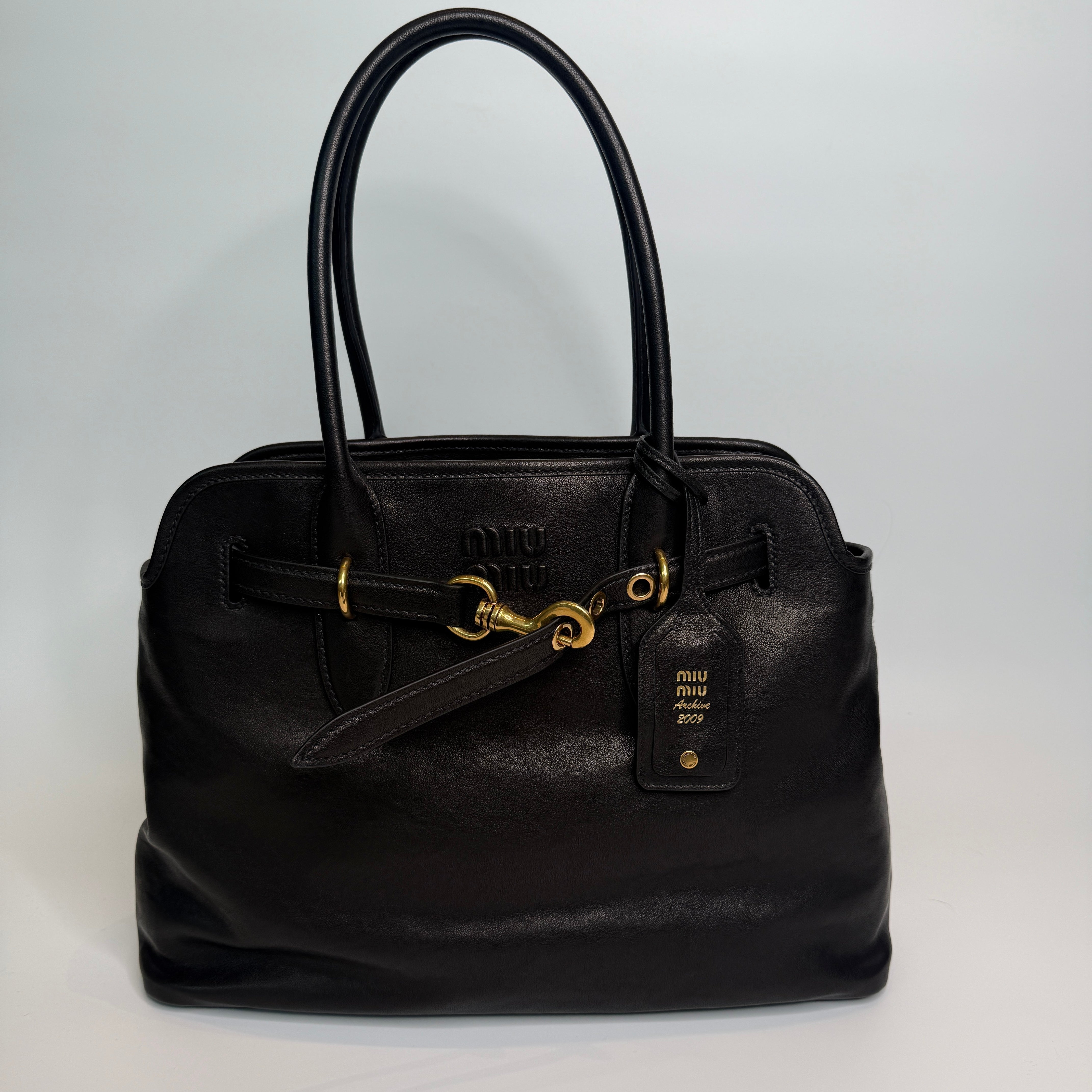 Miu Miu Aventure Large In Nappa Black Leather With Gold hardware trusted designer resale.