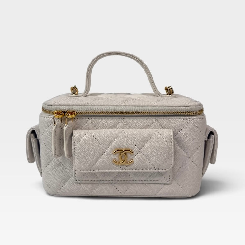Chanel Vanity Top Handle  Multi Pockets In White Caviar Leather With Gold Hardware. 100% authentic and preloved in excellent condition