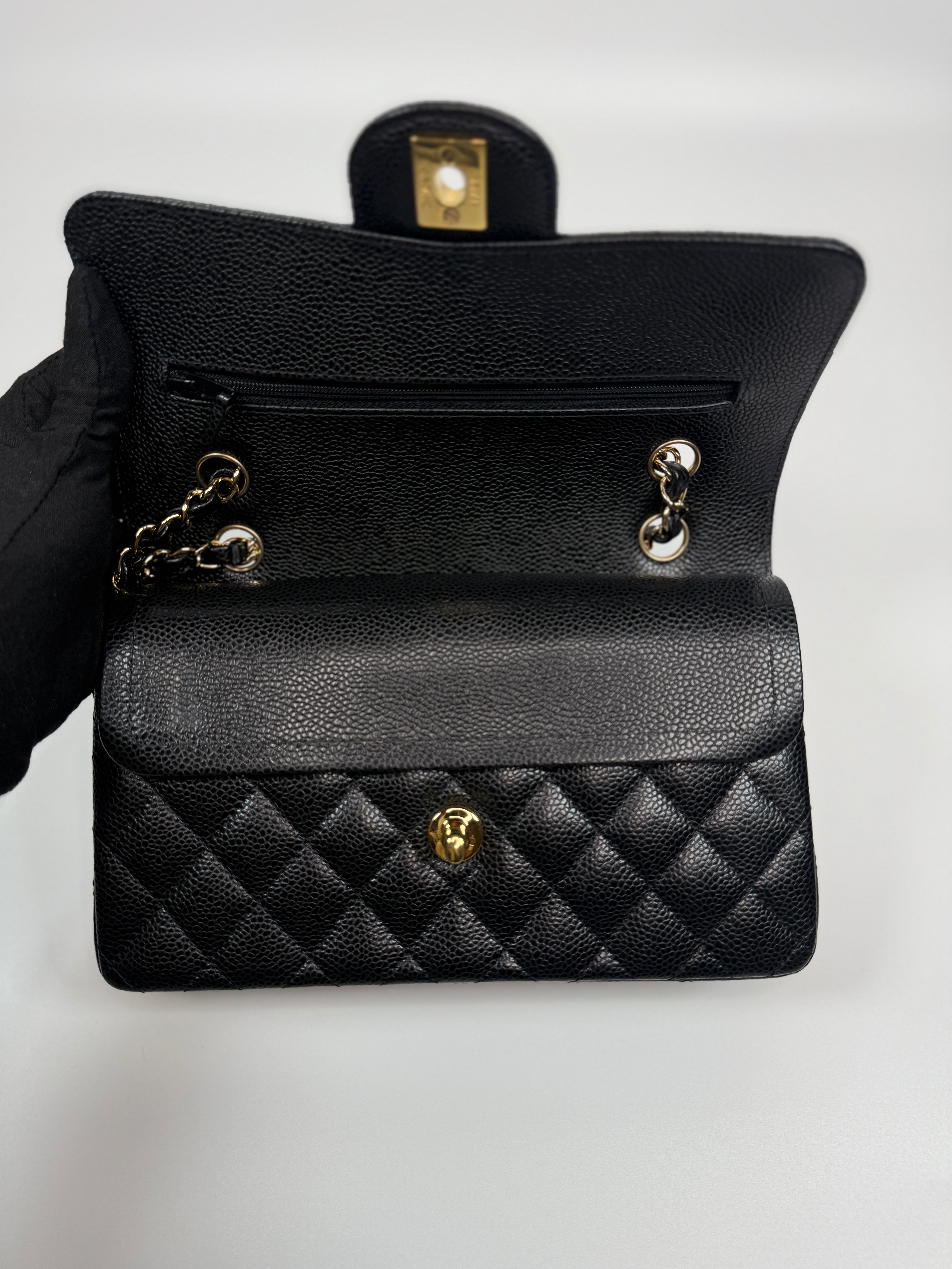 Chanel Small Classic Double Flap In Black Caviar Leather With Gold Hardware Authentic and Preloved In Excellent Condition. 100% Authenticity guarantee 