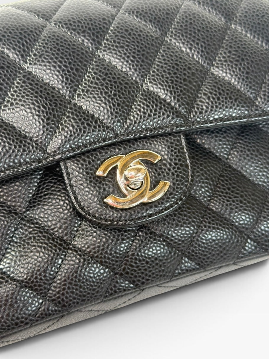 Chanel Vintage Small Classic Double Flap In Black Caviar Leather With Silver Hardware. 100% authentic and preloved in excellent condition
