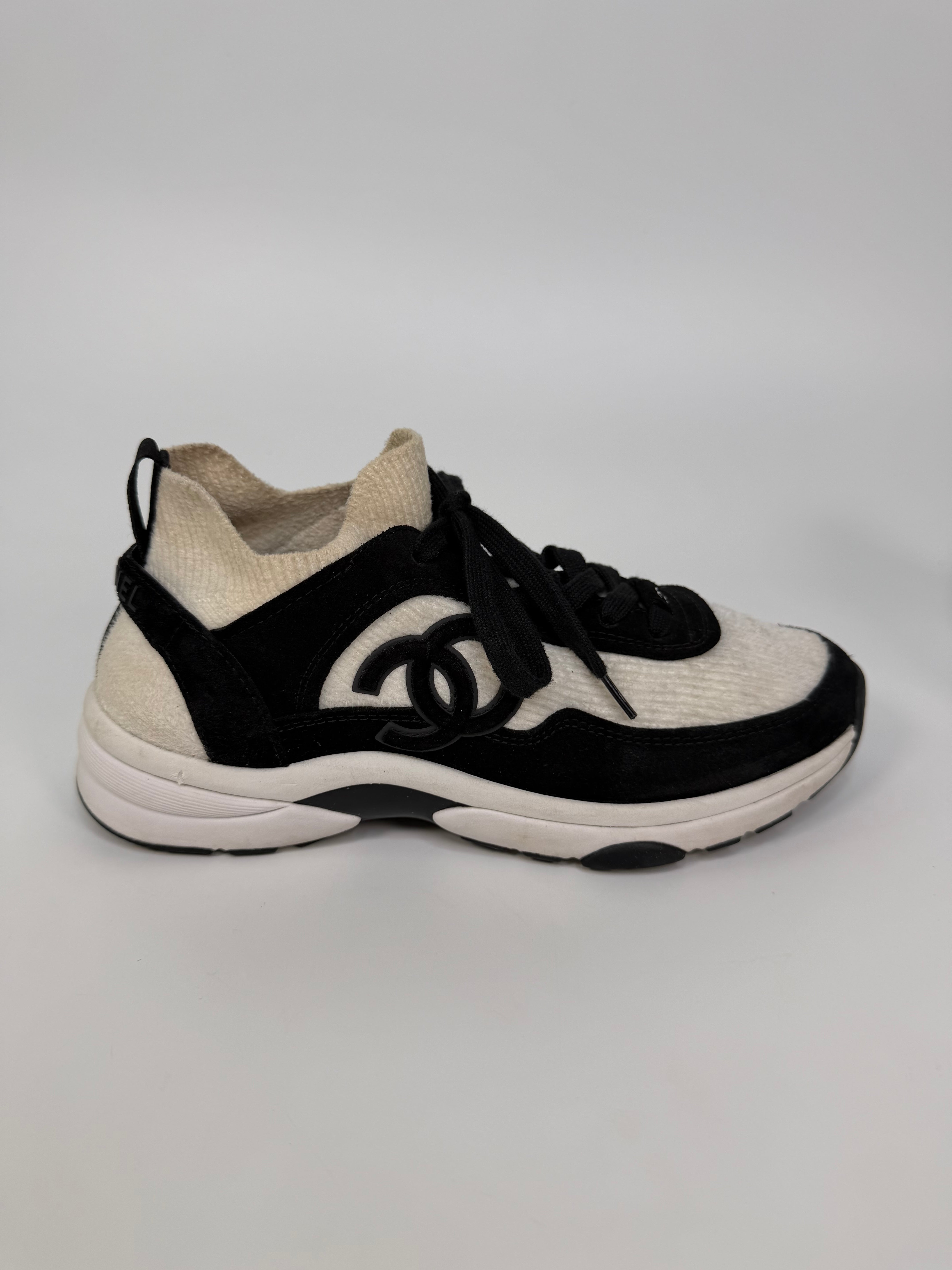Chanel CC Knit Sneakers (Size 39/UK6). Authentic and preloved in very good condition.