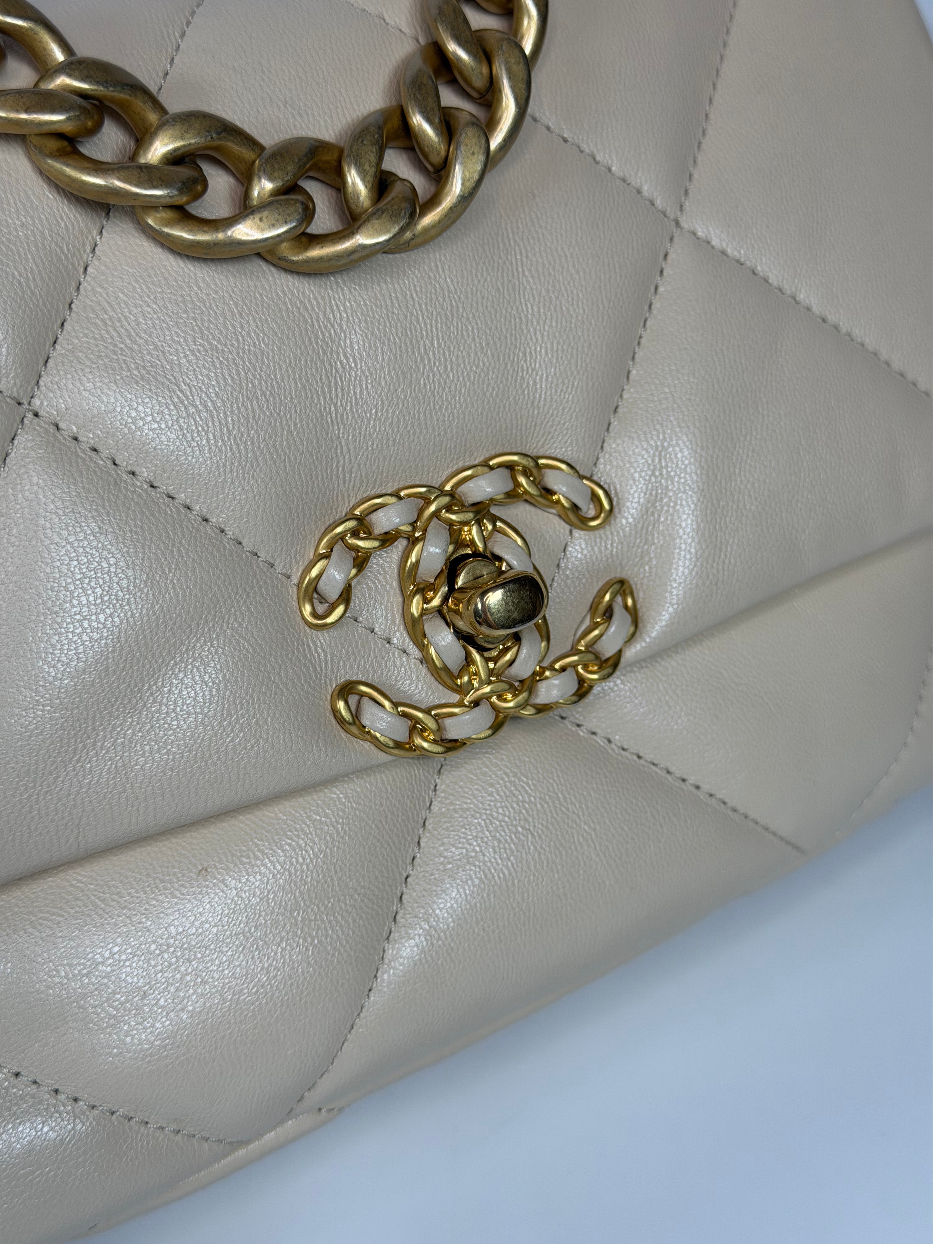 Chanel 19 Small In Beige Leather With Mixed Hardware. Authentic and preloved in excellent condition. Verified by Luxe Cheshire.