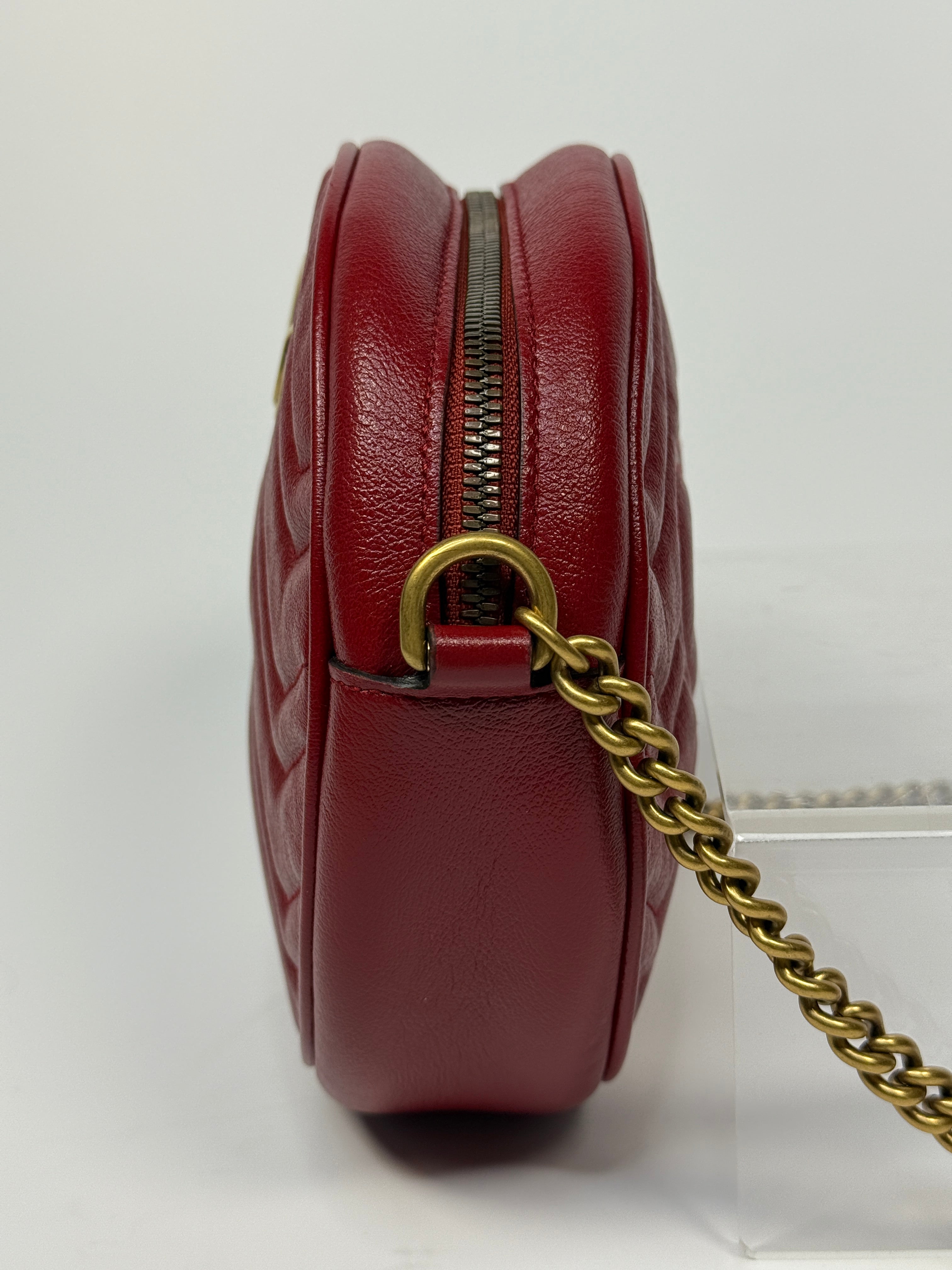 Gucci GG Marmont Round Shoulder Bag In Red Leather, very good condition. Authentic and preloved. 100% Authenticity guarantee