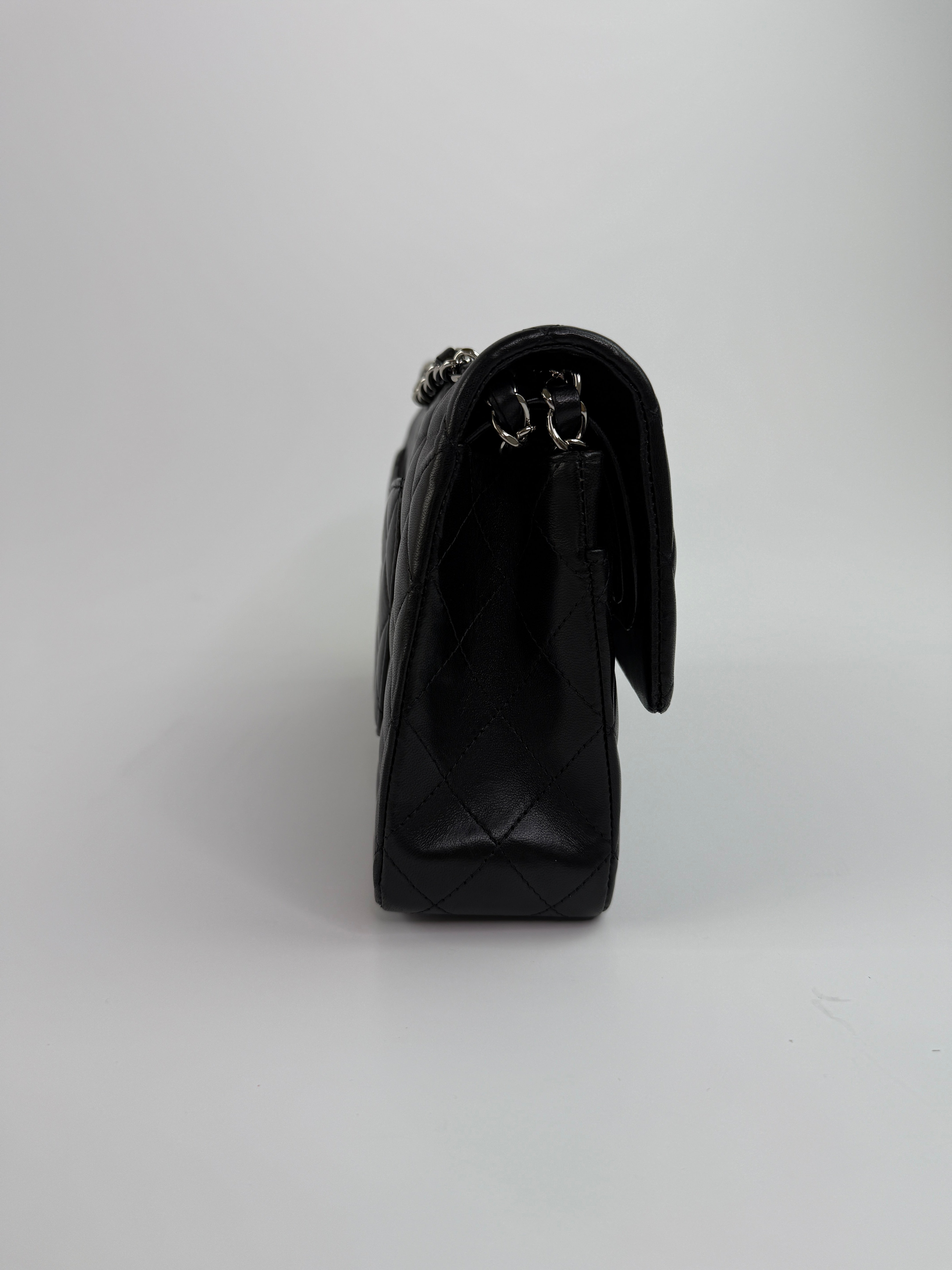 Chanel Medium Classic Double Flap Black Lambskin Leather With Silver Hardware
Pre Loved & Authentic 