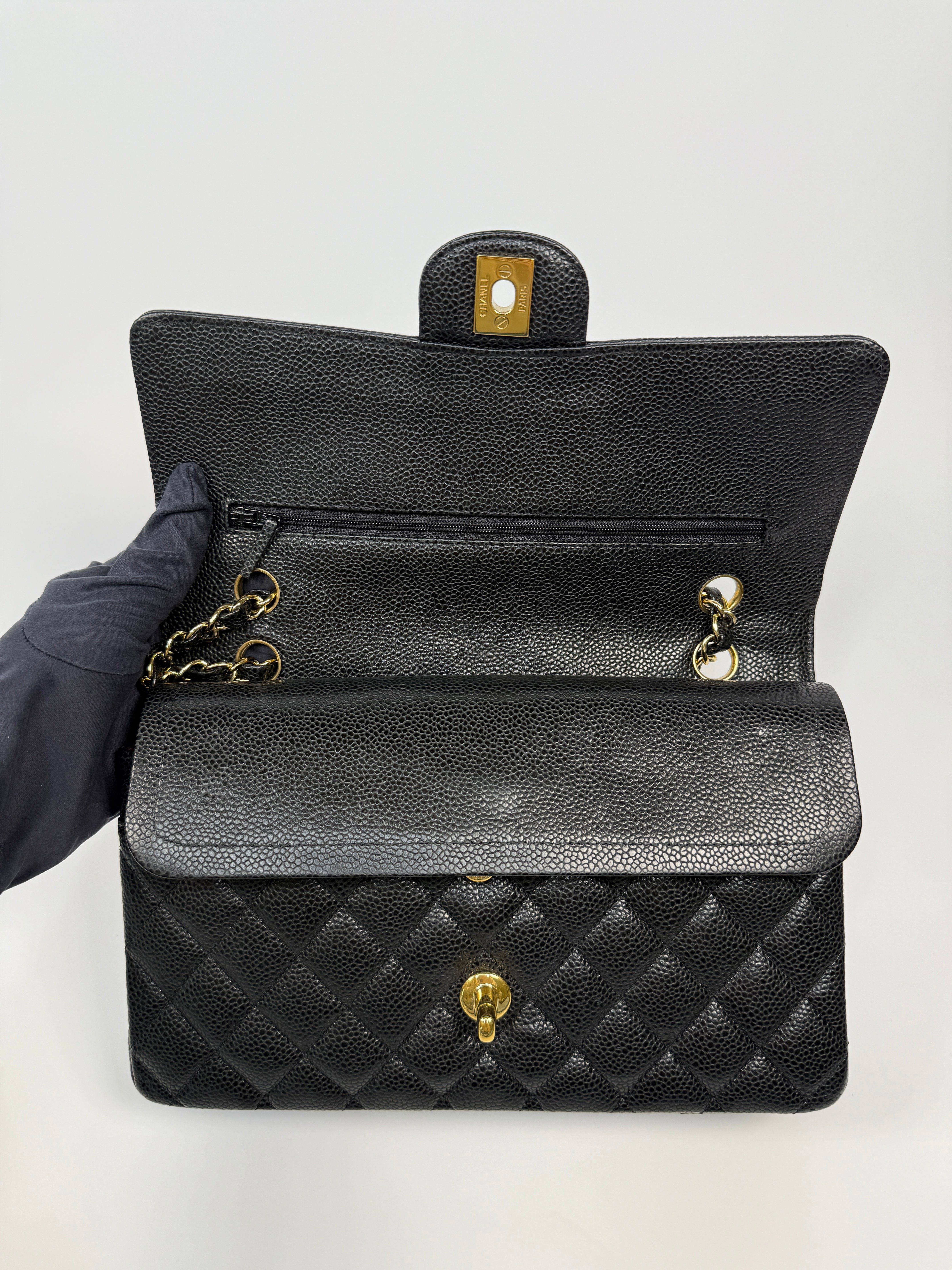 Chanel Medium Classic Double Flap Black CaviarWith Gold Hardware
Pre Loved & Authentic 