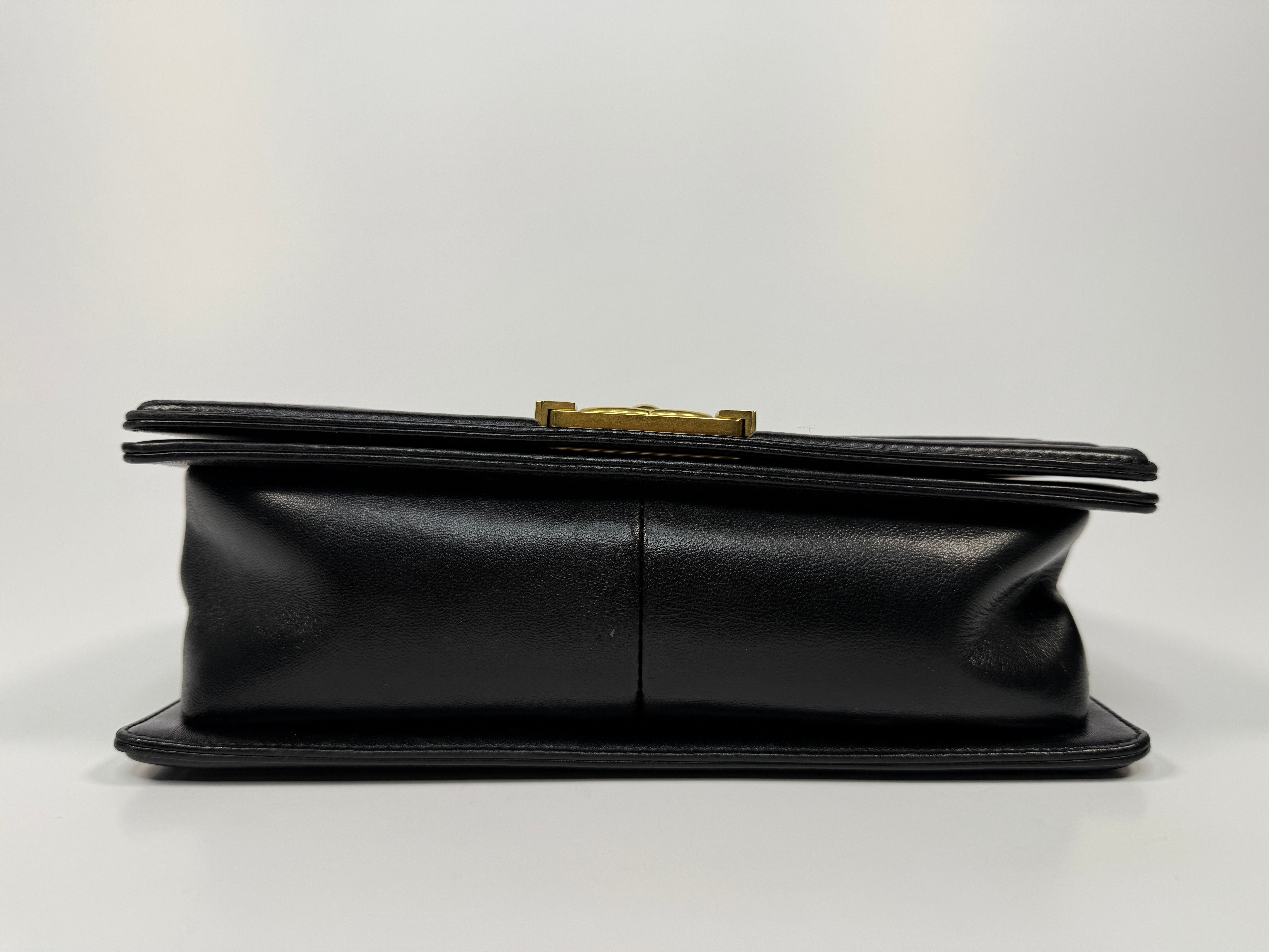 Chanel Black Chevron Fabric & Lambskin Leather Medium Boy Bag With Gold Hardware. Very Good Condition. Authentic and preloved. 