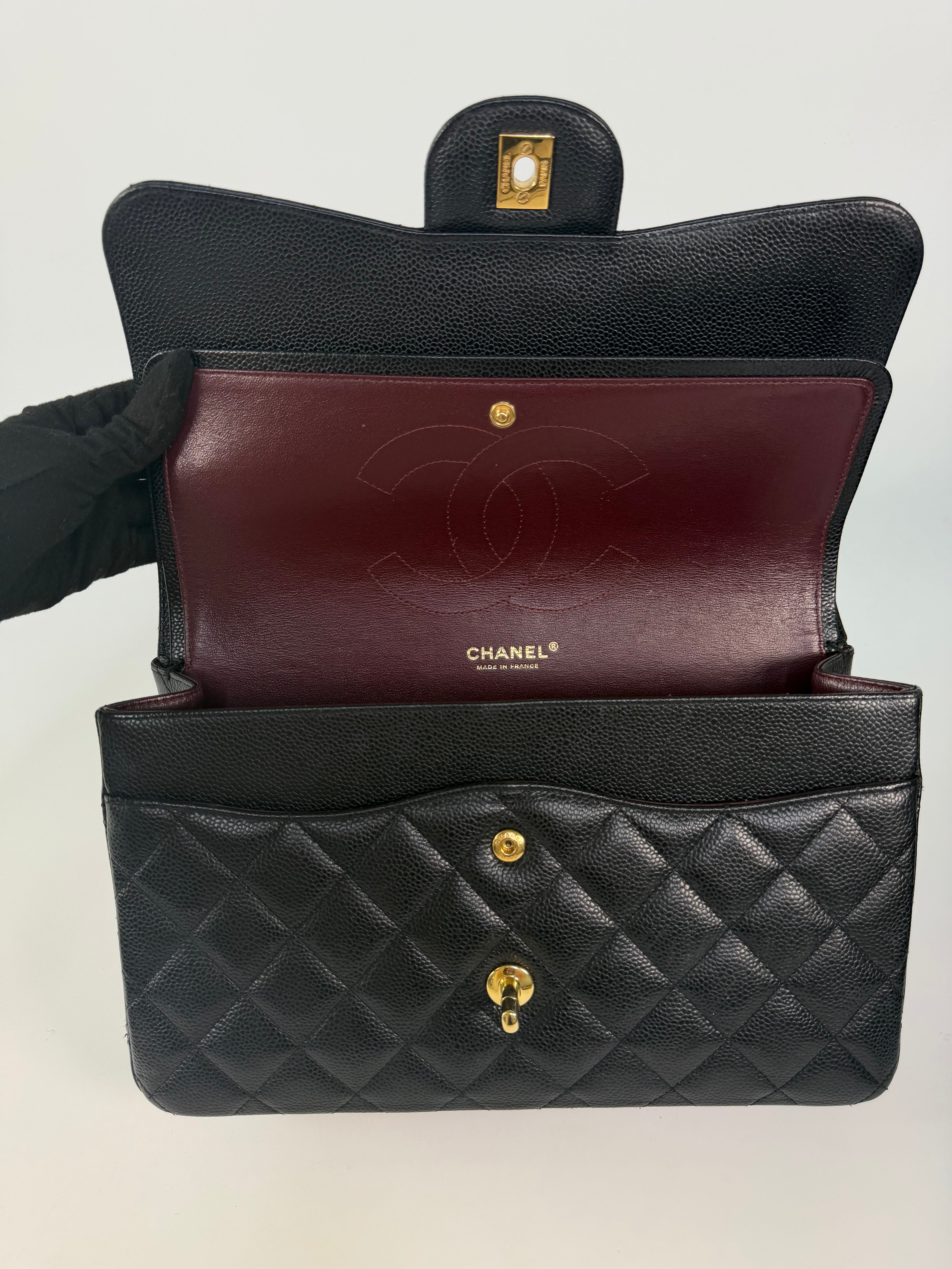 Chanel Jumbo Classic Flap Bag In Black Caviar Leather With Gold Hardware 100% authentic and preloved in excellent condition