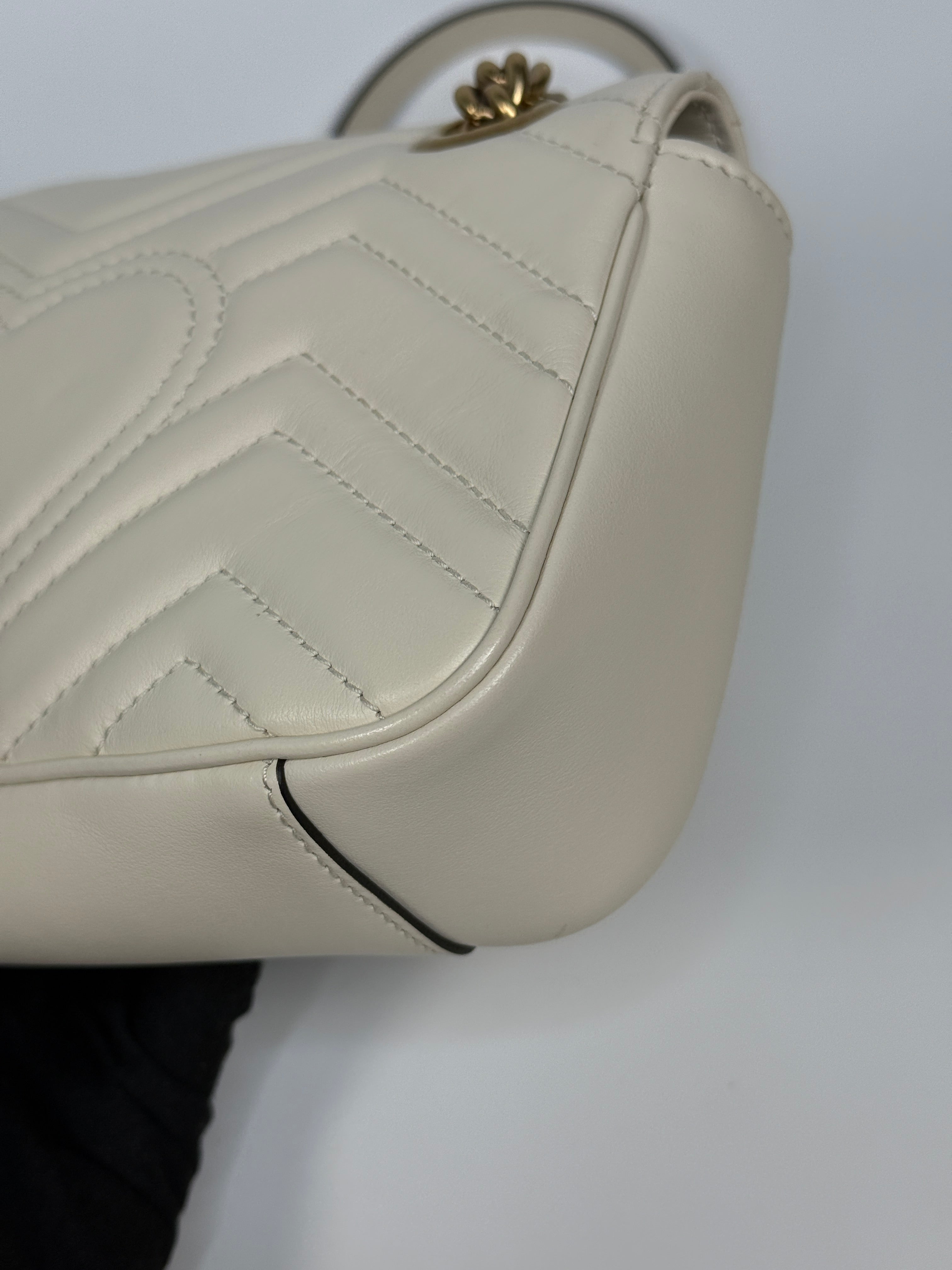 Gucci GG Small Marmont Matelasse Shoulder Bag In Ivory Leather With Gold Hardware 