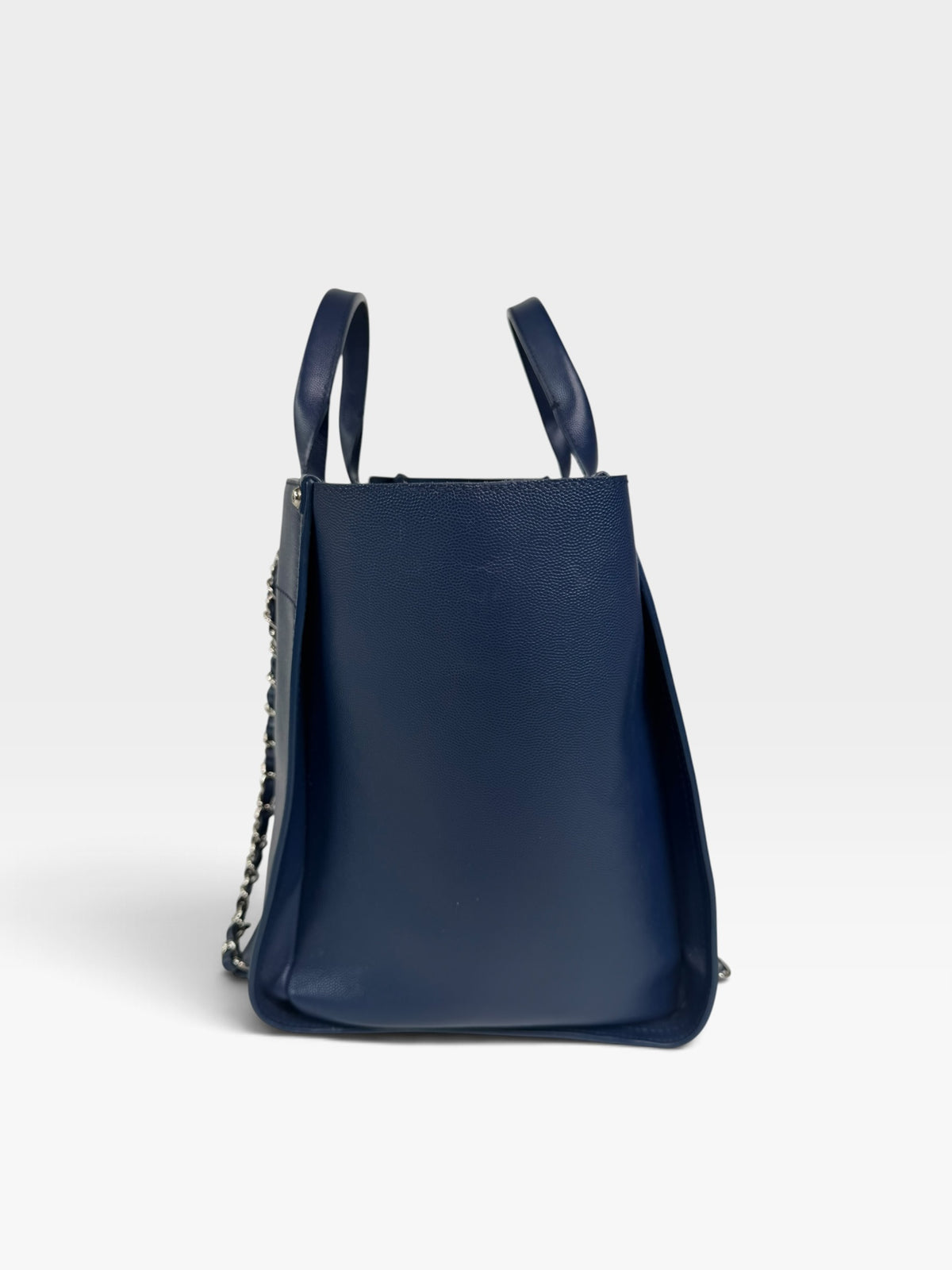 Chanel Medium Deauville In Blue Leather With Silver Hardware. Authentic and preloved in very good condition. 100% Luxe guarantee 