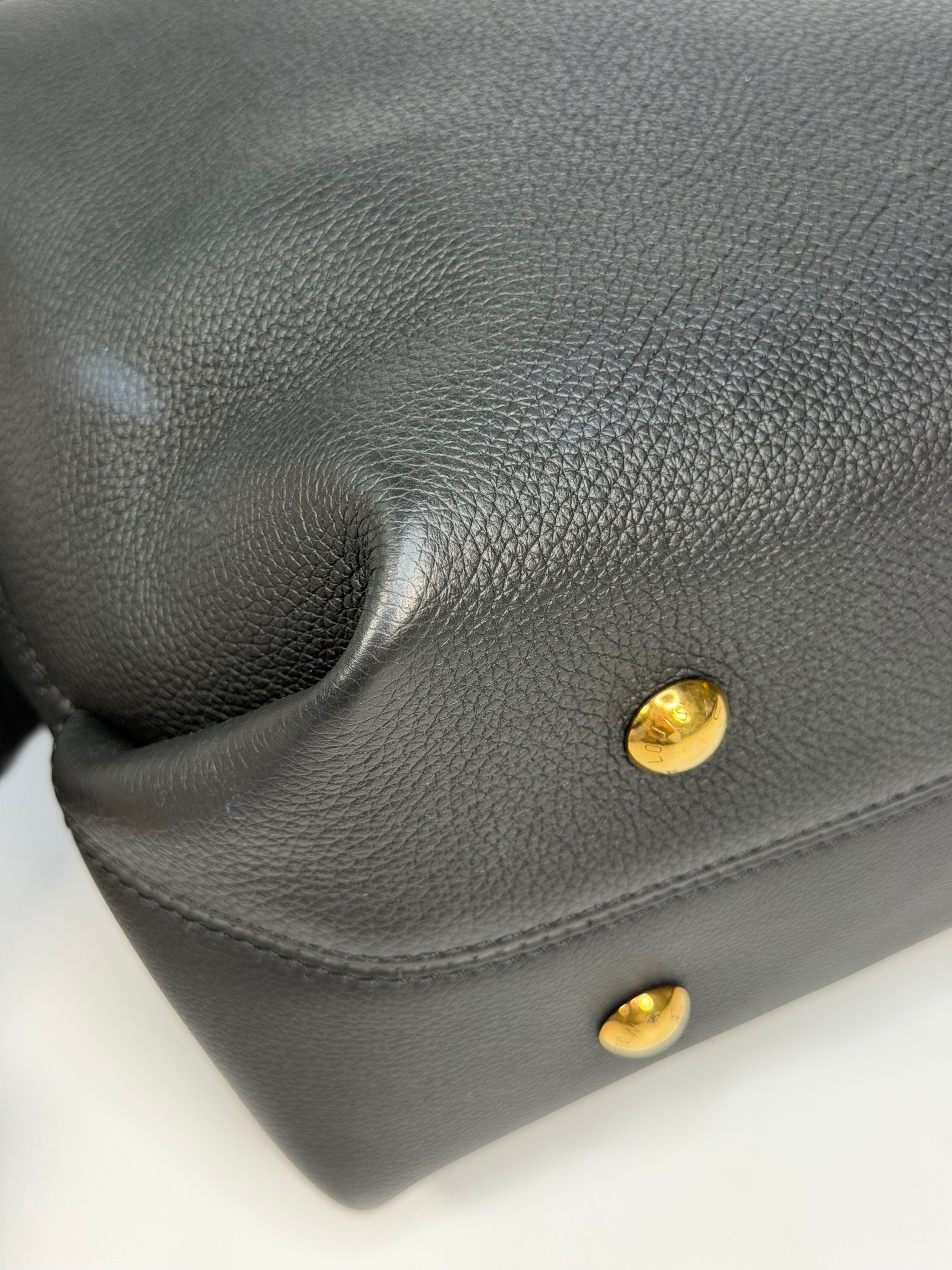 Louis Vuitton Low Key Cabas MM In Black Calfskin With Gold Hardware. Authentic and preloved in excellent condition