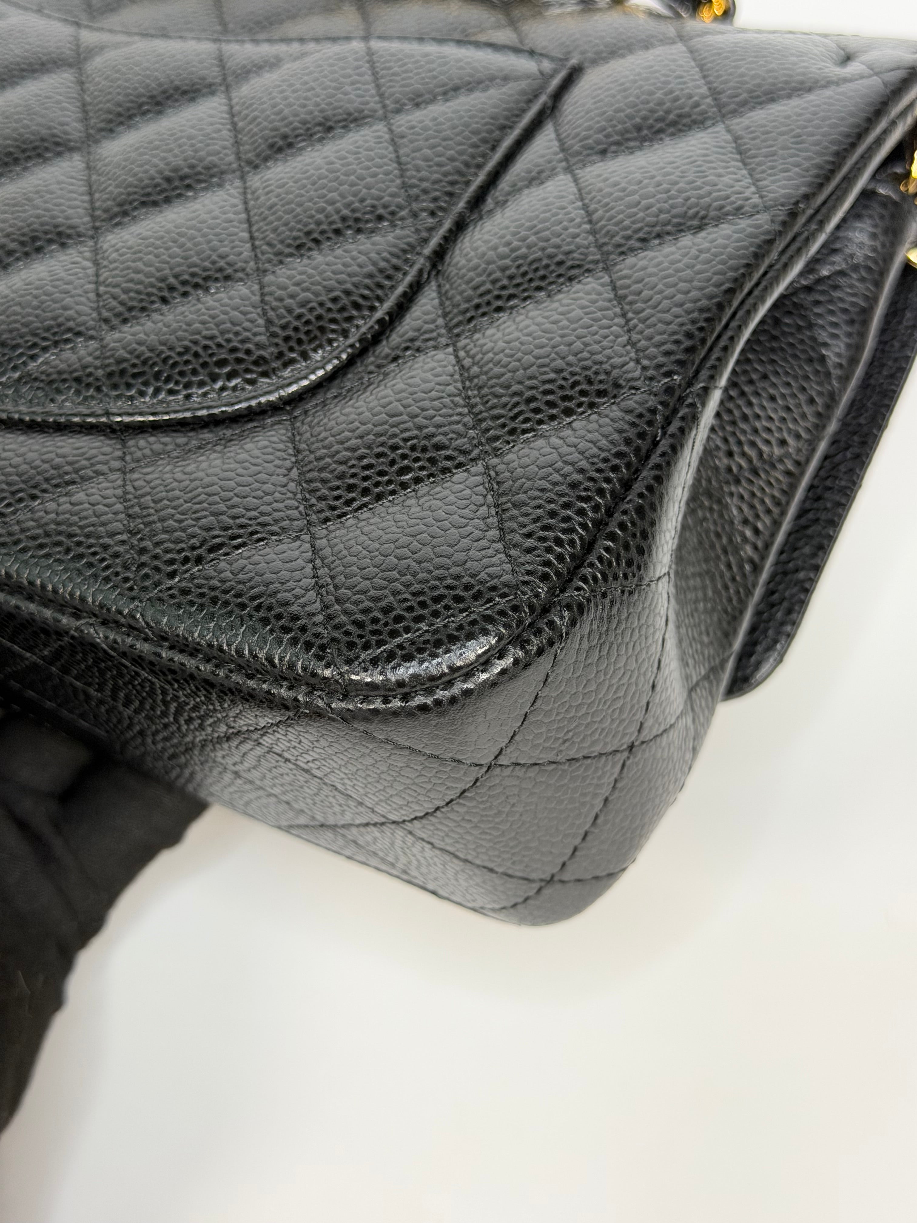 Chanel Medium Classic Double Flap In Black Caviar With Gold Hardware. Authentic and preloved in new and unused condition. 