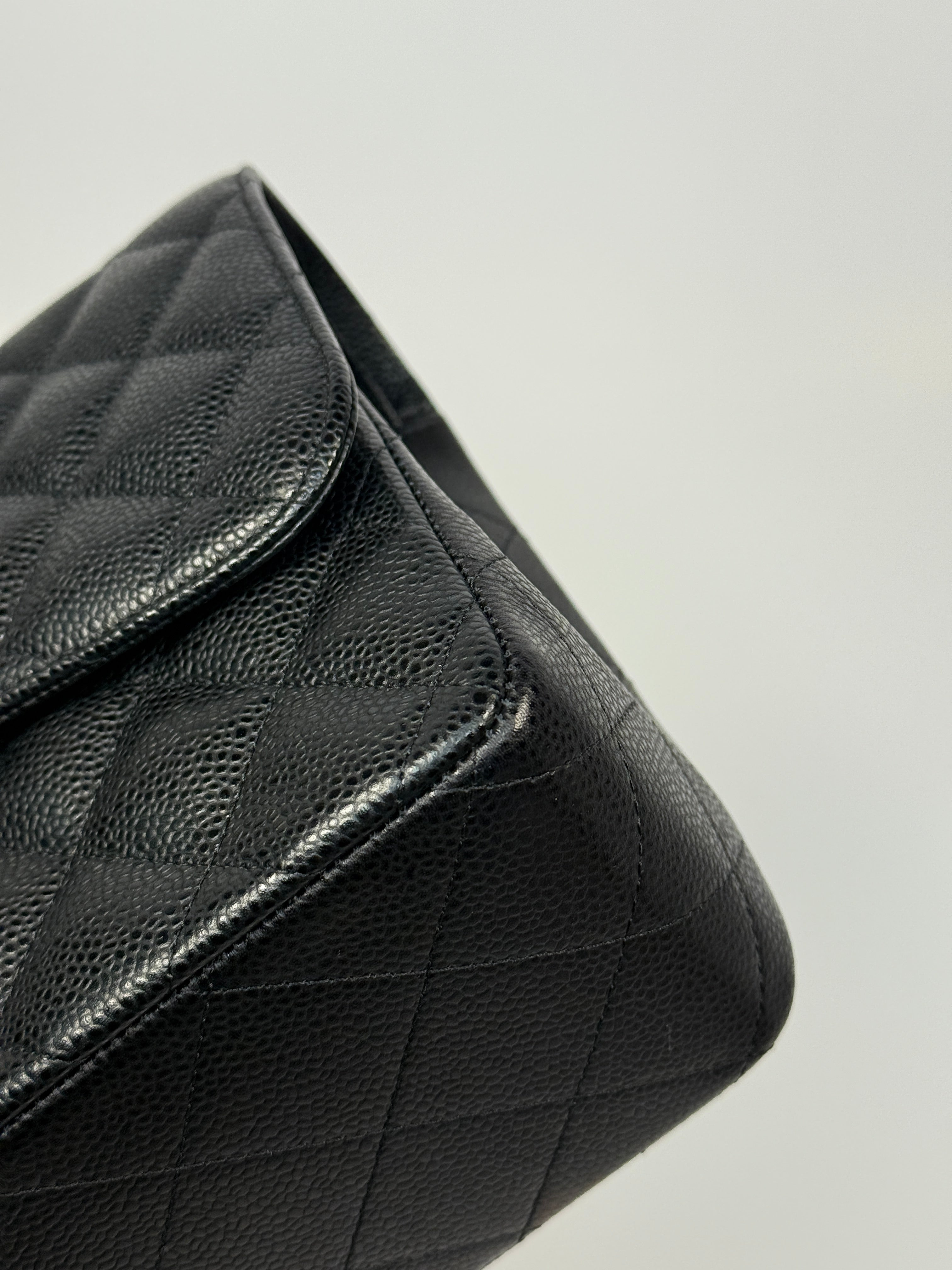 Chanel Classic Jumbo Flap Bag In Black Caviar Leather With Silver Hardware. Authentic and preloved. Excellent condition.