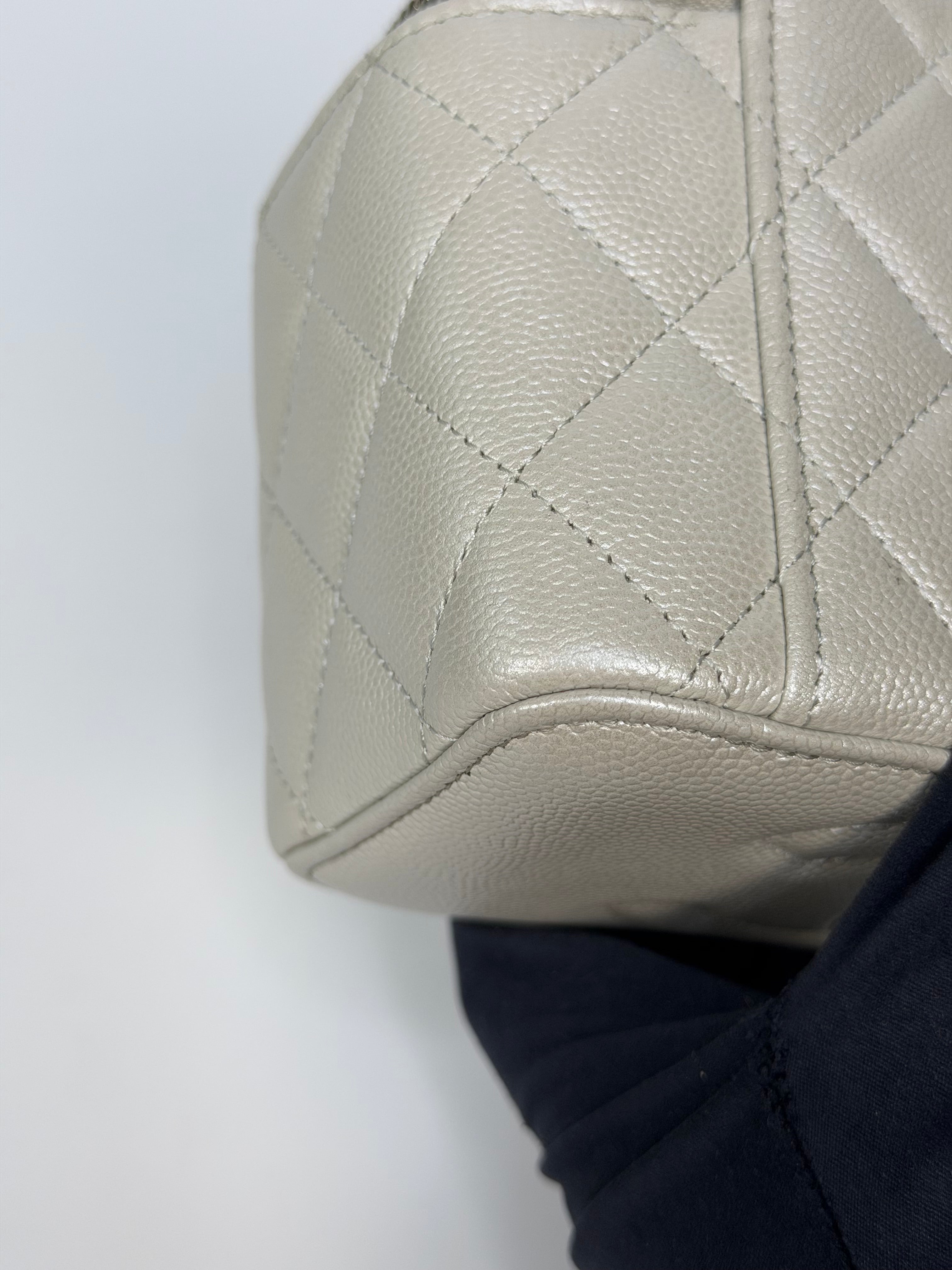Chanel  Vanity In Light Pearl Grey Caviar Leather With Gold Hardware. Authentic and preloved in excellent condition.
