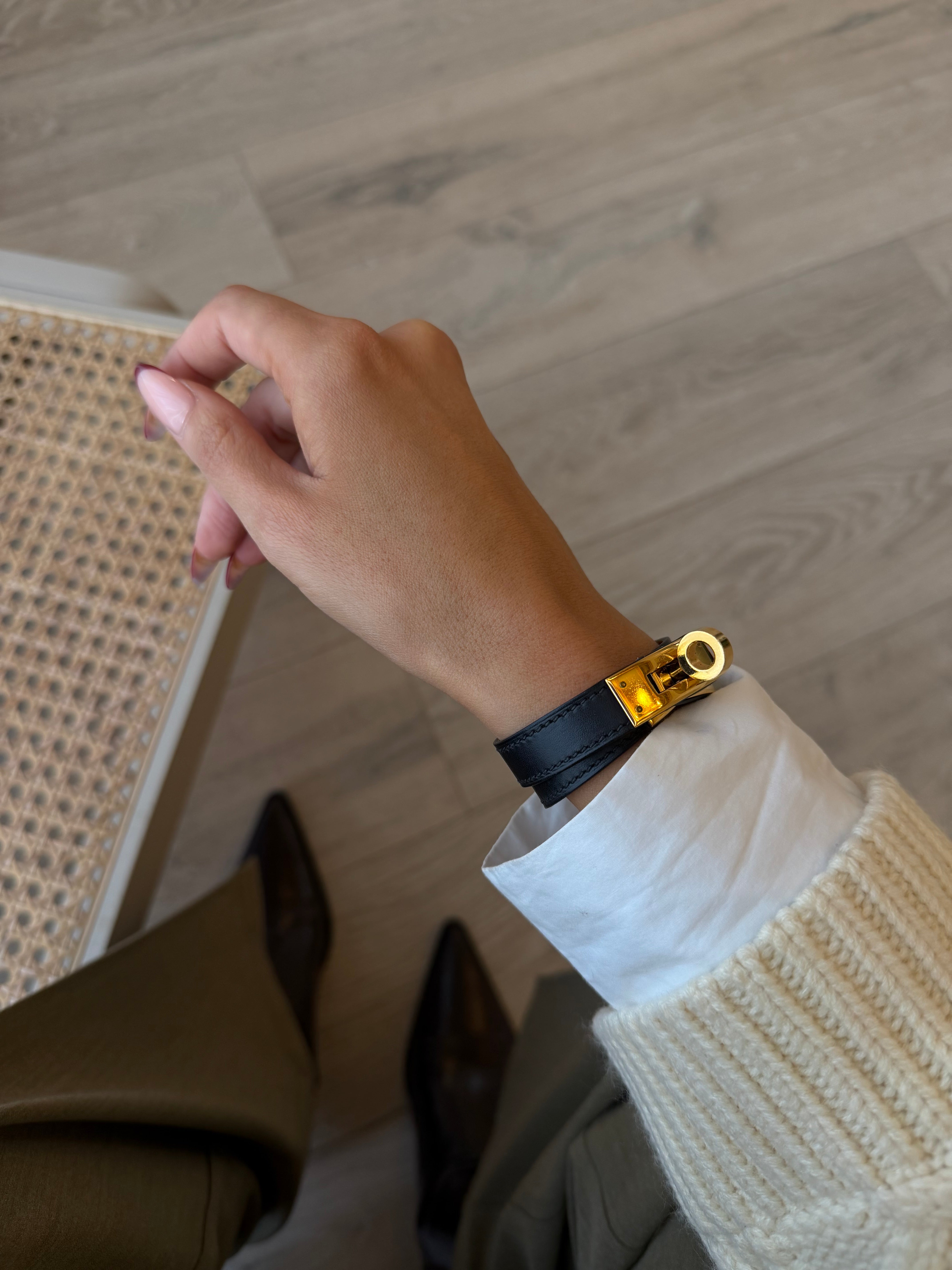 Hermès Kelly Double Tour Bracelet in black leather with gold hardware 