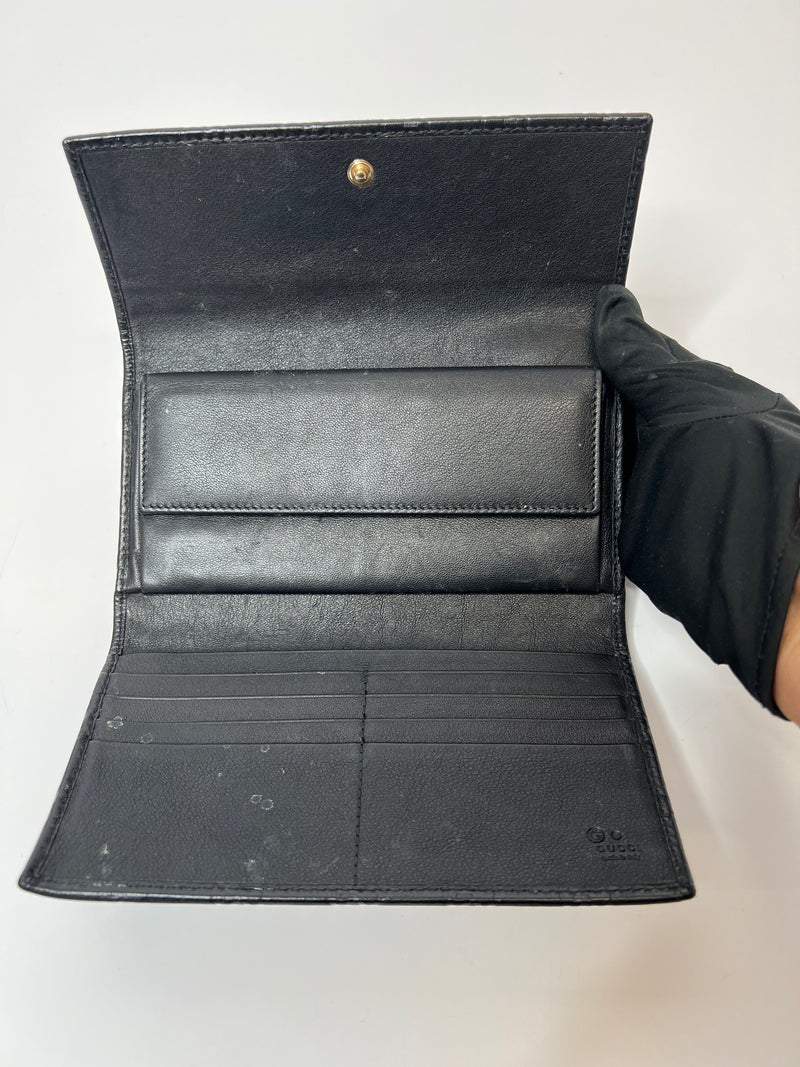 Gucci Black Leather GG Embossed Wallet