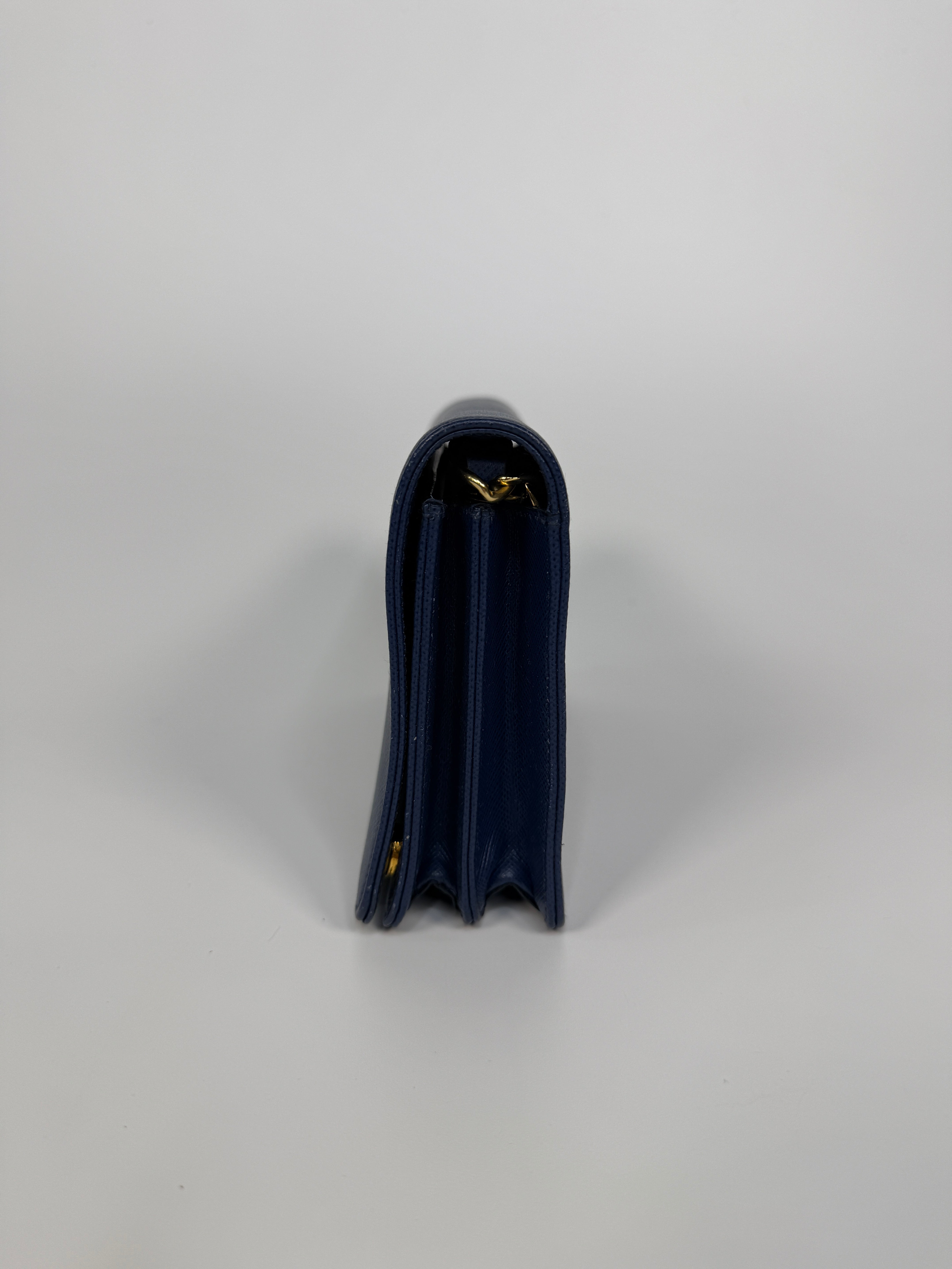 Authentic and preloved Prada Wallet Chain Bag In Blue Saffiano Leather With Gold Hardware. Very Good condition. 100% Authenticity guarantee 