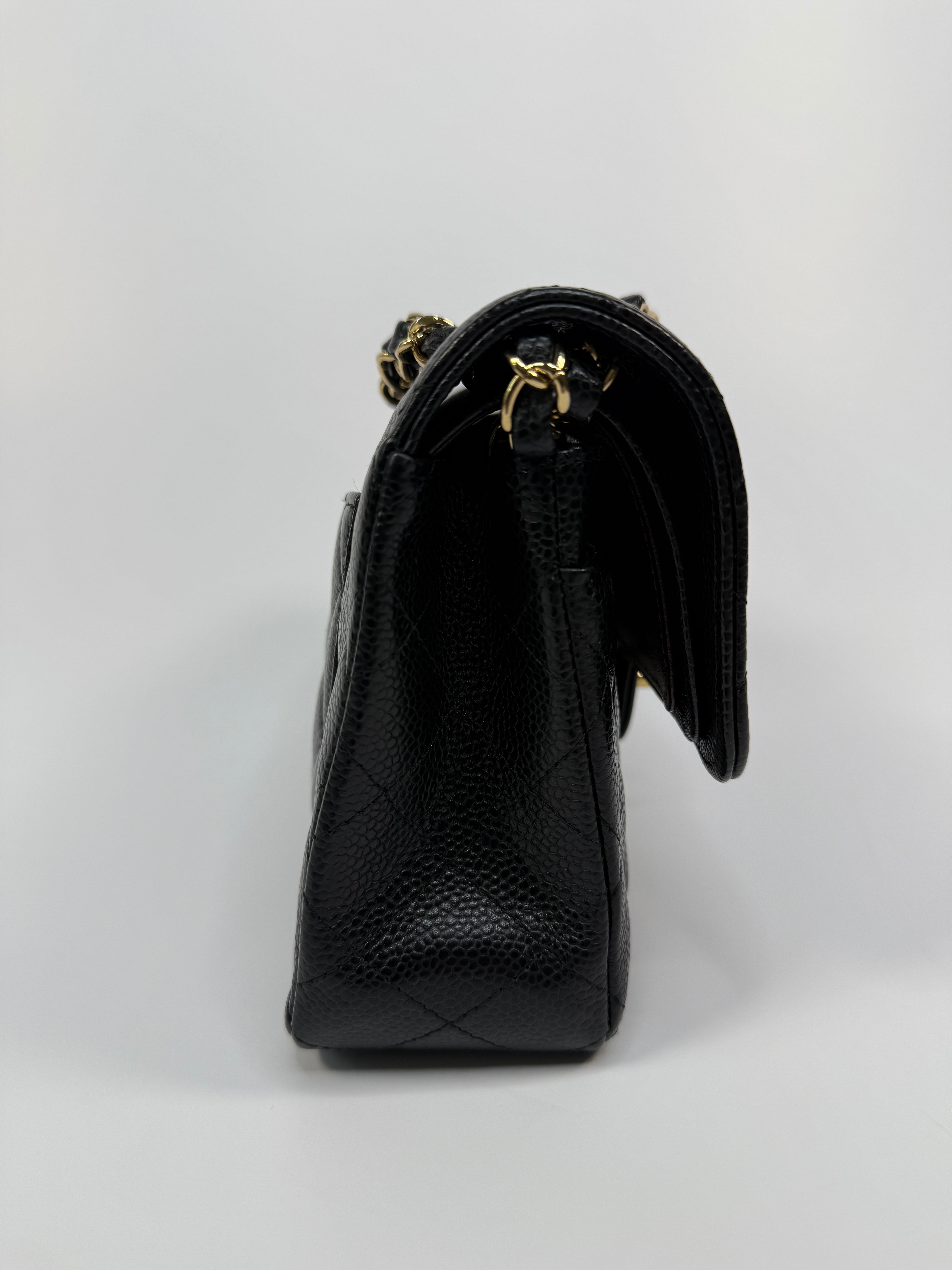 Chanel Small Classic Double Flap In Black Caviar Leather With Gold Hardware
Pre Loved & Authentic 