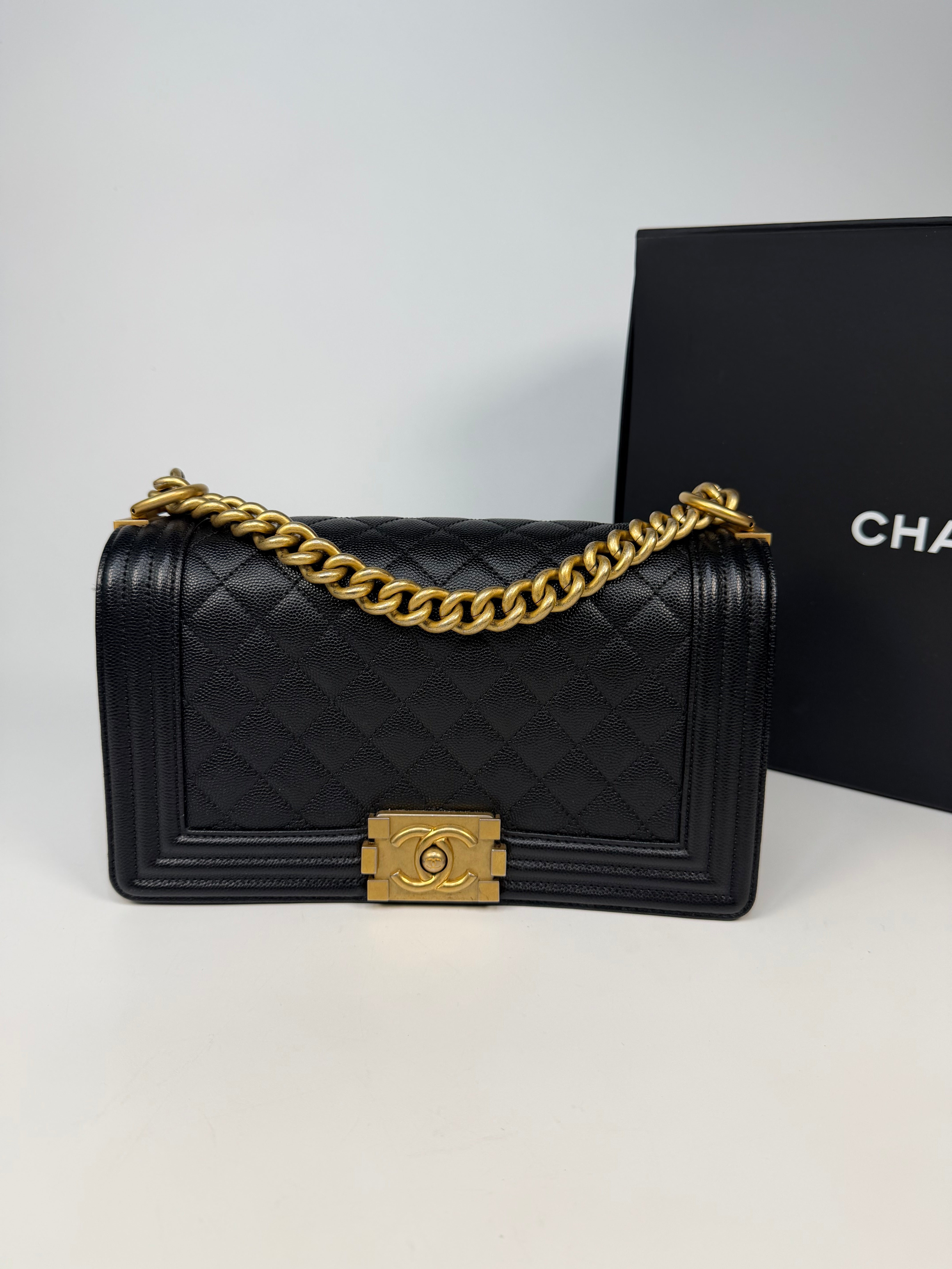  Chanel Boy Bag In Black Caviar Leather With Gold Hardware. Authentic and preloved in excellent condition. Insured next day delivery. Verified by Luxe Cheshire