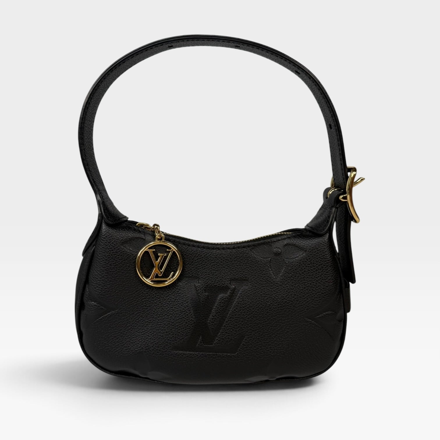 Louis Vuitton Mini Moon Bag In Black Leather With Gold Hardware in excellent condition 100% authentic and preloved