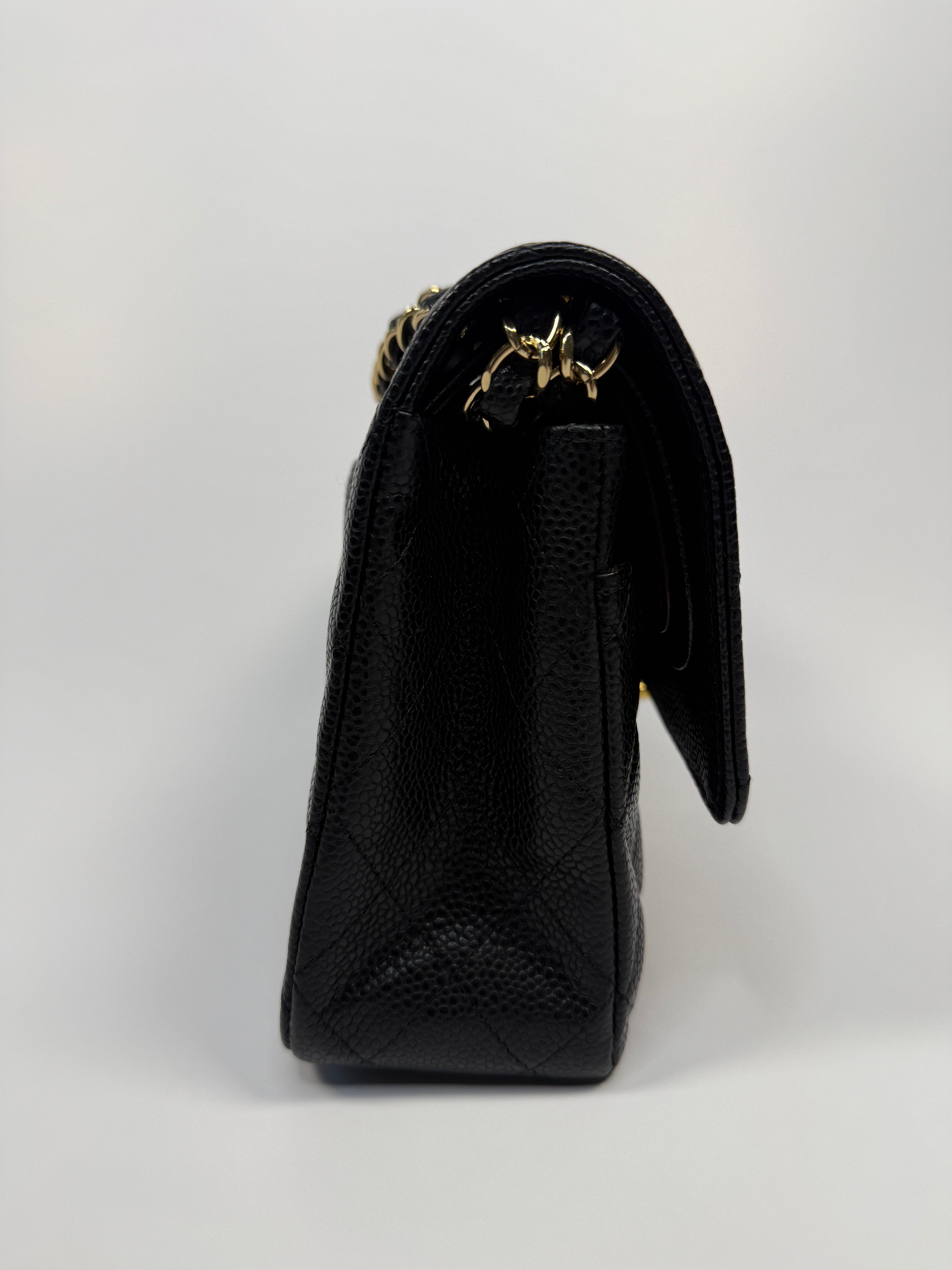 Chanel Medium Classic Double Flap Black CaviarWith Gold Hardware
Pre Loved & Authentic 