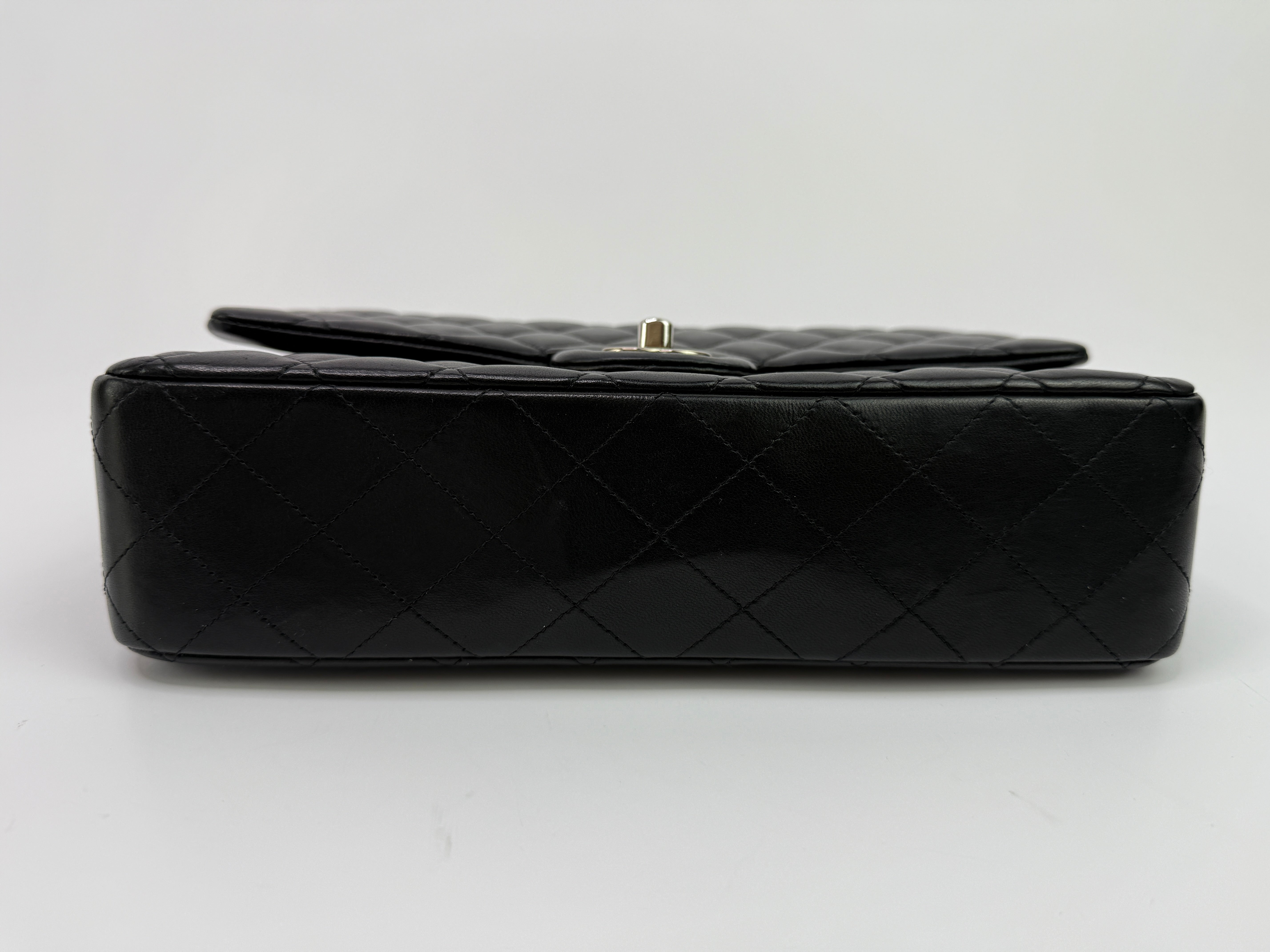 Authentic and preloved Chanel Medium Classic Double Flap Black Lambskin With Silver hardware Excellent condition. 100% Authenticity guarantee 