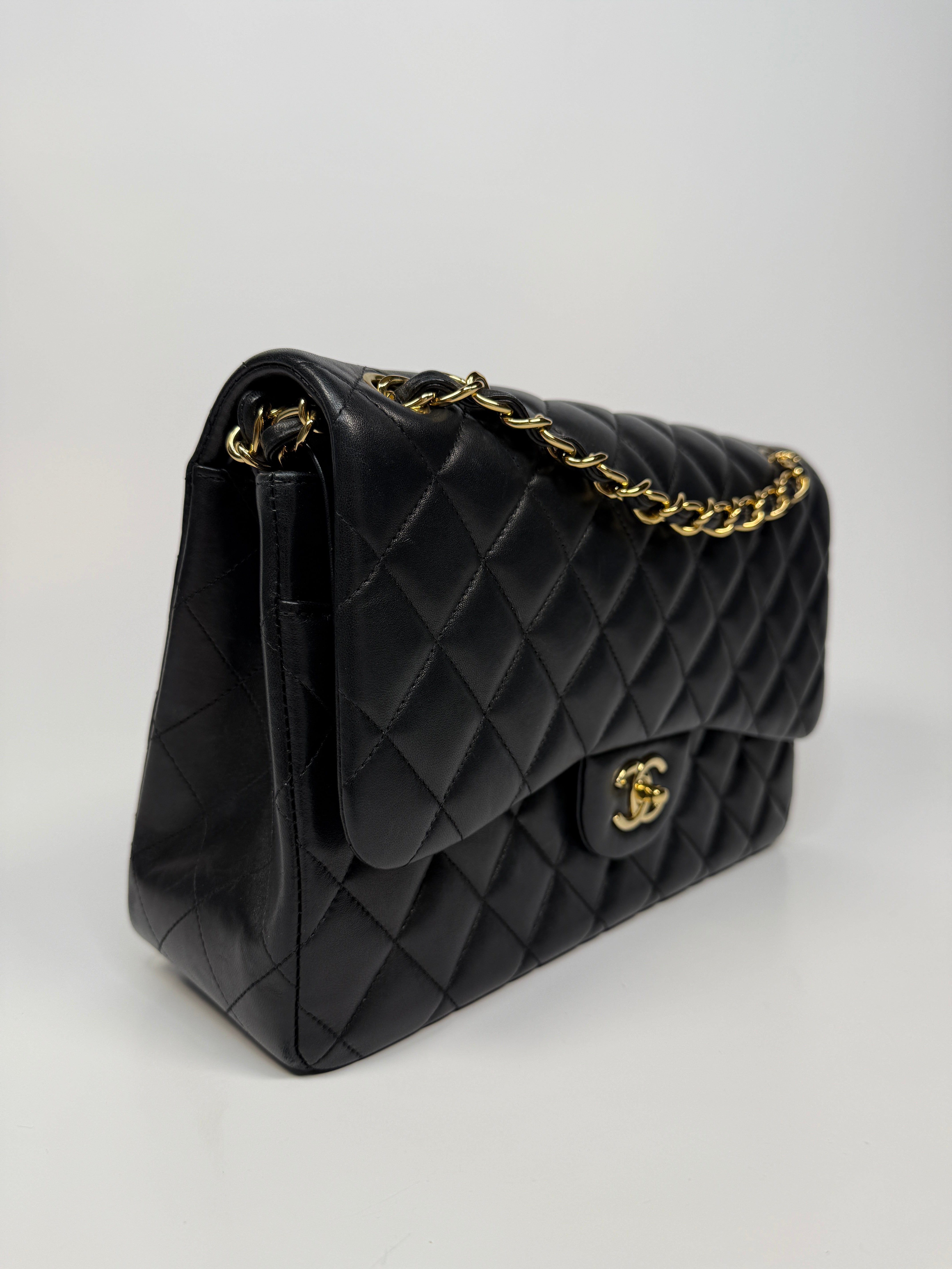 Chanel Jumbo Classic Flap Bag In Black Lambskin Leather With Gold Hardware
Pre Loved & Authentic