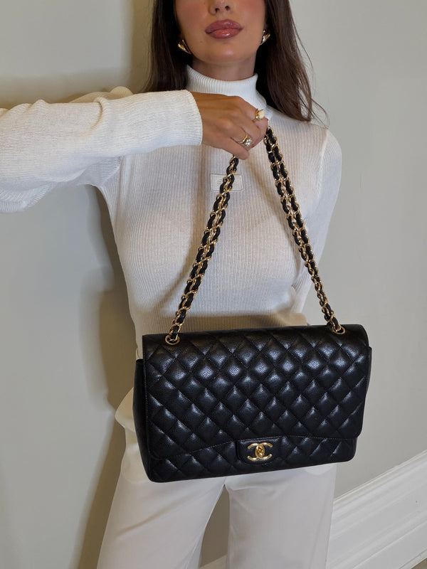 Chanel Maxi Classic Double Flap In Black Caviar Leather With GHW