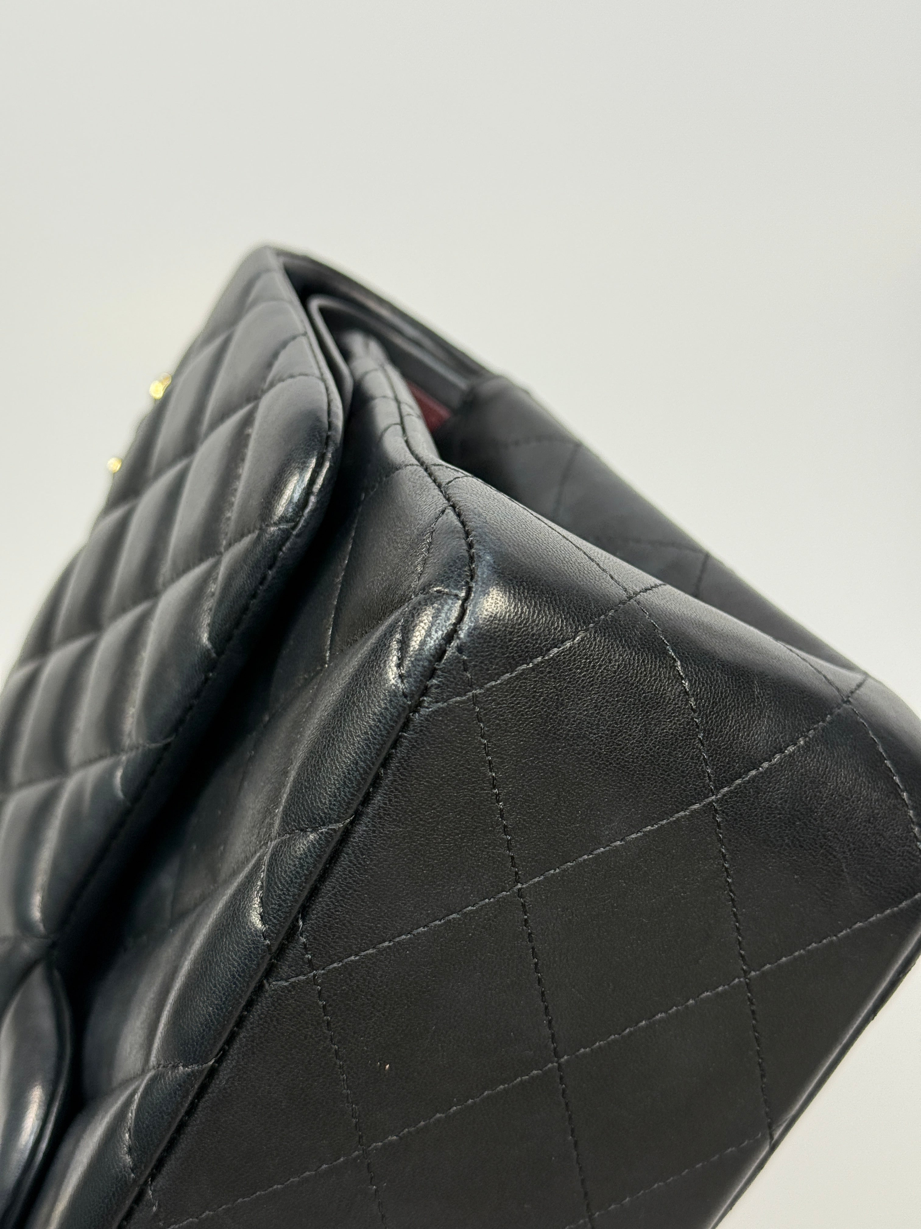 Chanel Jumbo Classic Flap Bag In Black Lambskin Leather With Gold Hardware
Pre Loved & Authentic