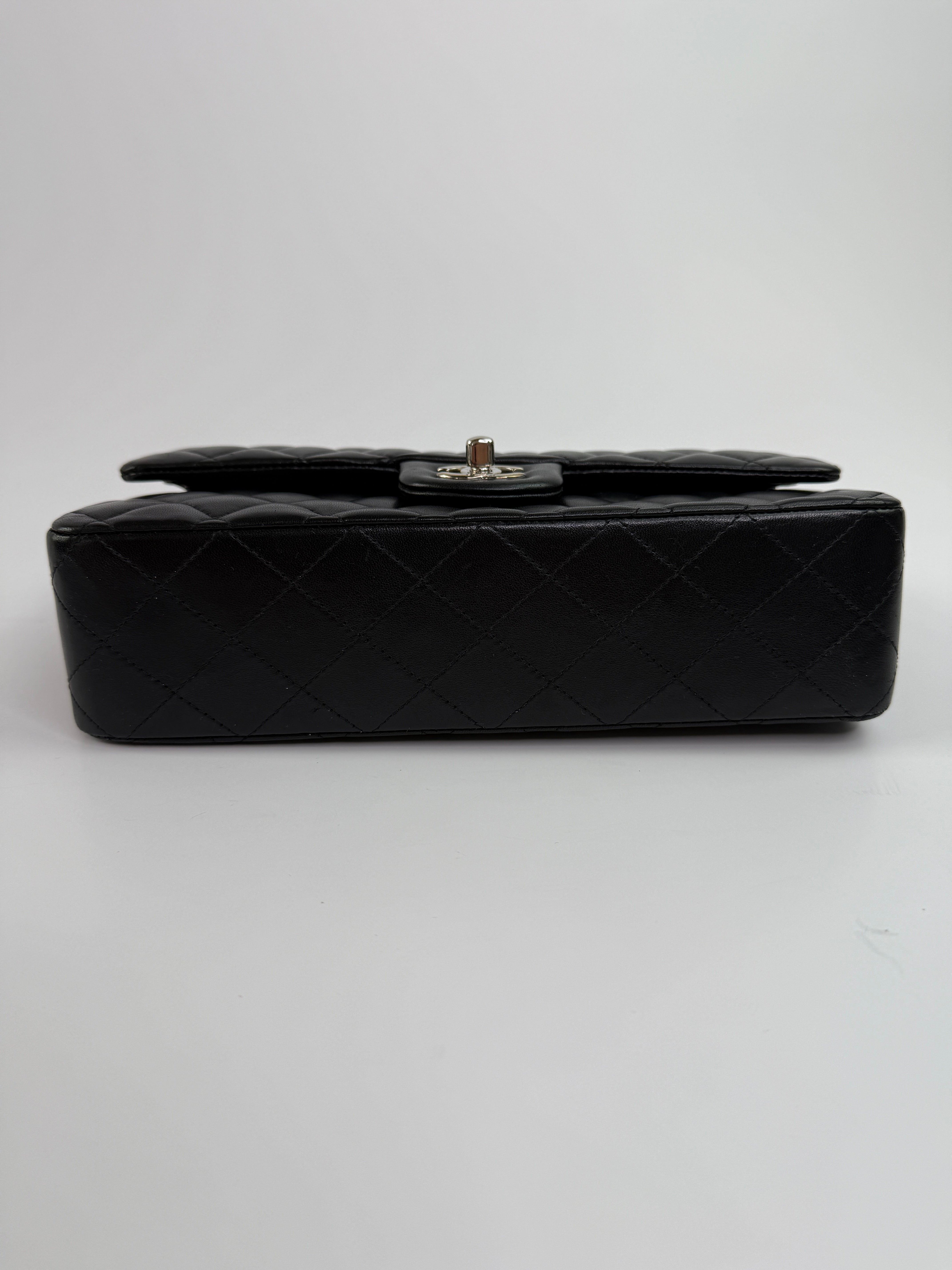 Chanel Medium Classic Double Flap Black Lambskin Leather With Silver Hardware
Pre Loved & Authentic 