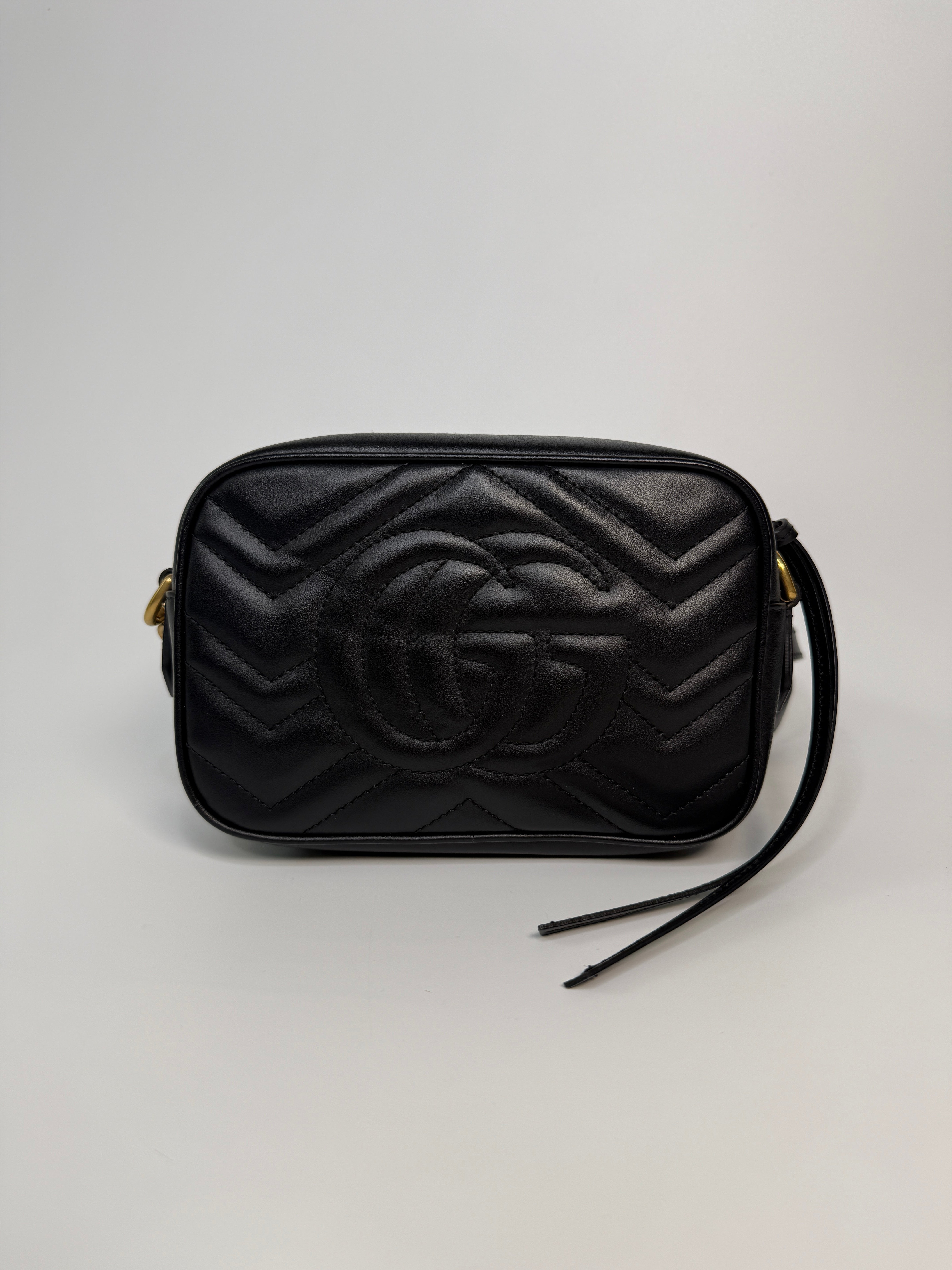 Gucci Small Marmont Camera Bag In Black Leather With Gold Hardware In Excellent Condition.
Authentic Pre Loved Verified by Luxe Cheshire Trusted Designer resale 
