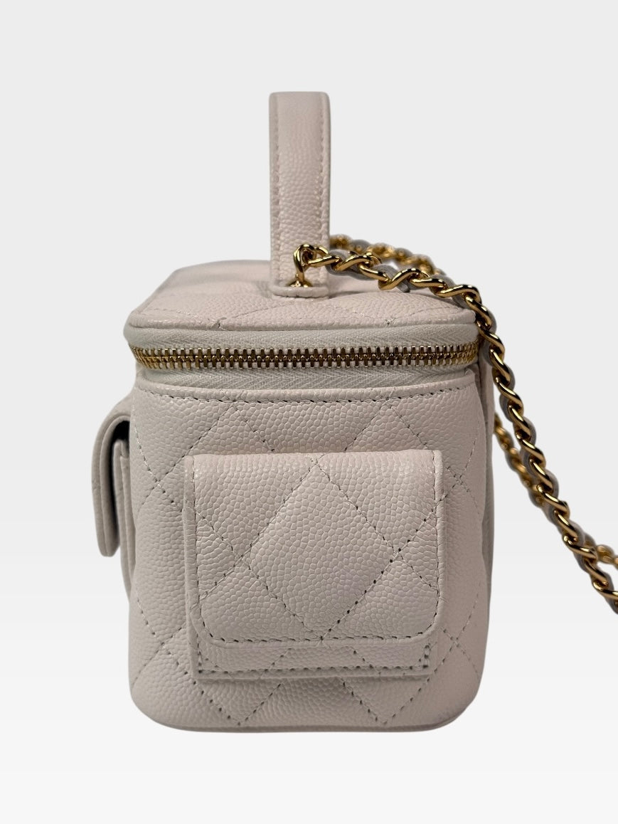 Chanel Vanity Top Handle  Multi Pockets In White Caviar Leather With Gold Hardware. 100% authentic and preloved in excellent condition