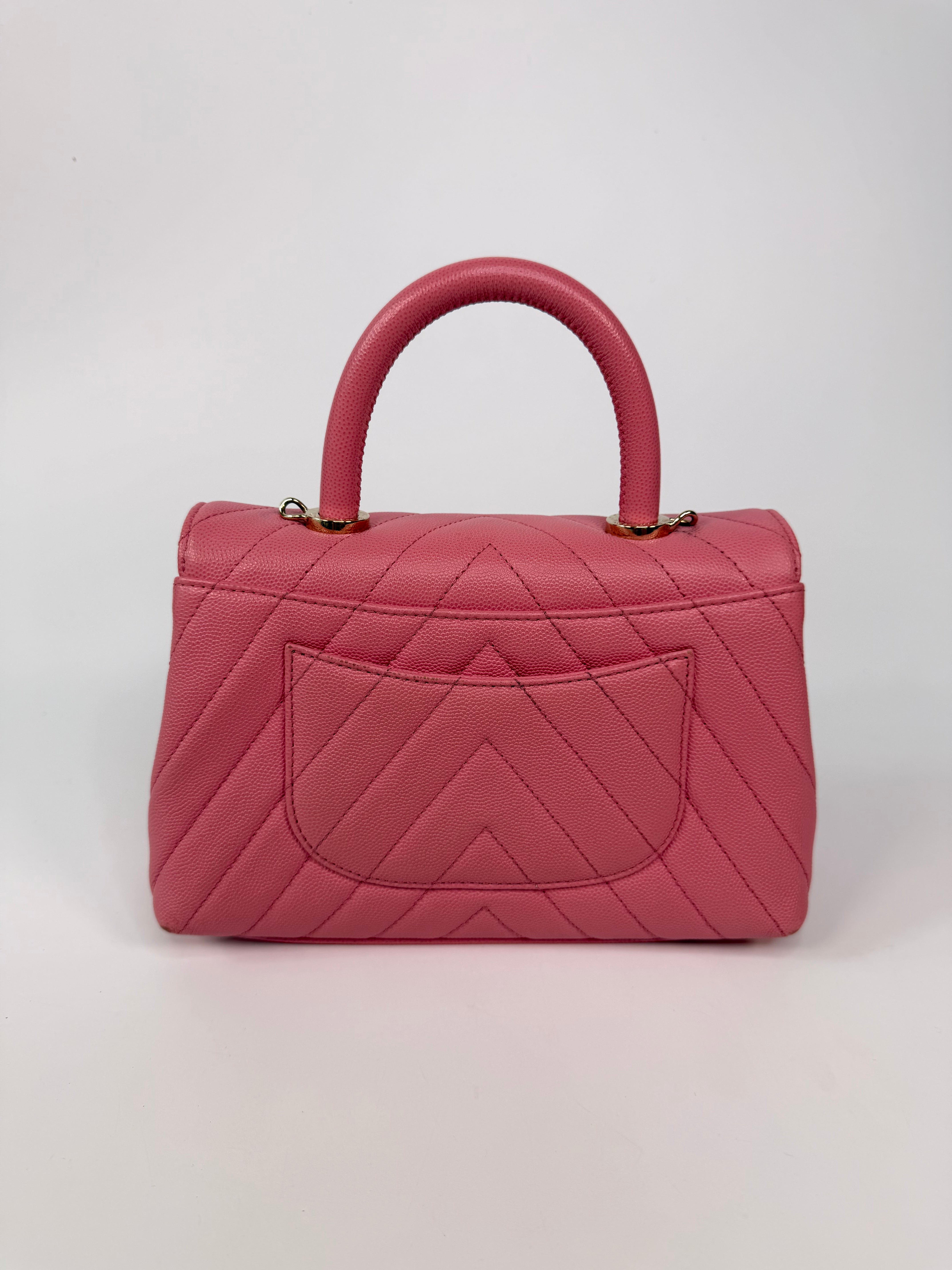 Chanel Small Chevron Coco Top Handle In Pink Caviar With Gold Hardware. 100% authentic and preloved in very good condition.
