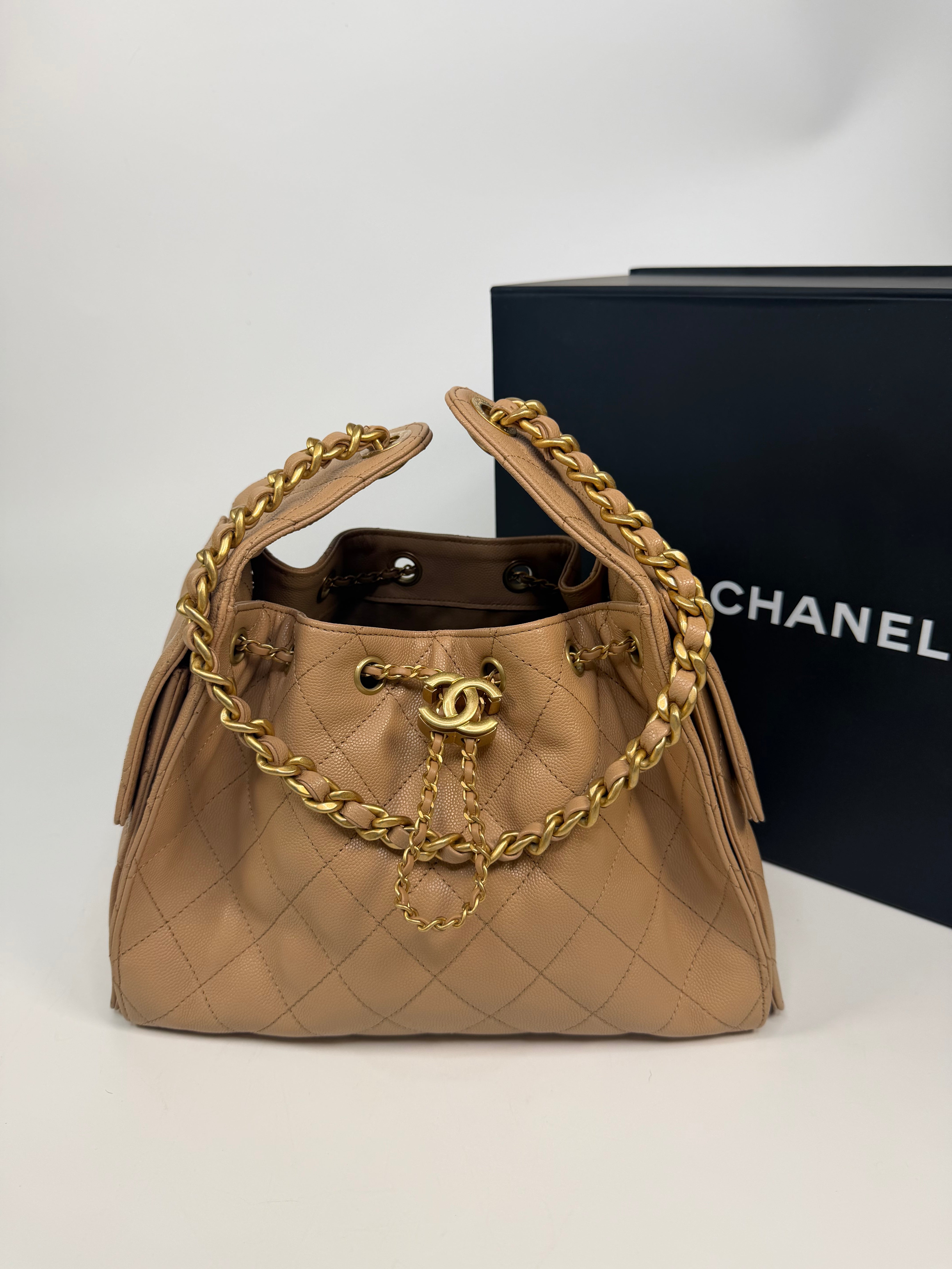Chanel 25 Small In Beige Caviar Leather With Gold Hardware. 100% authentic and preloved in excellent condition