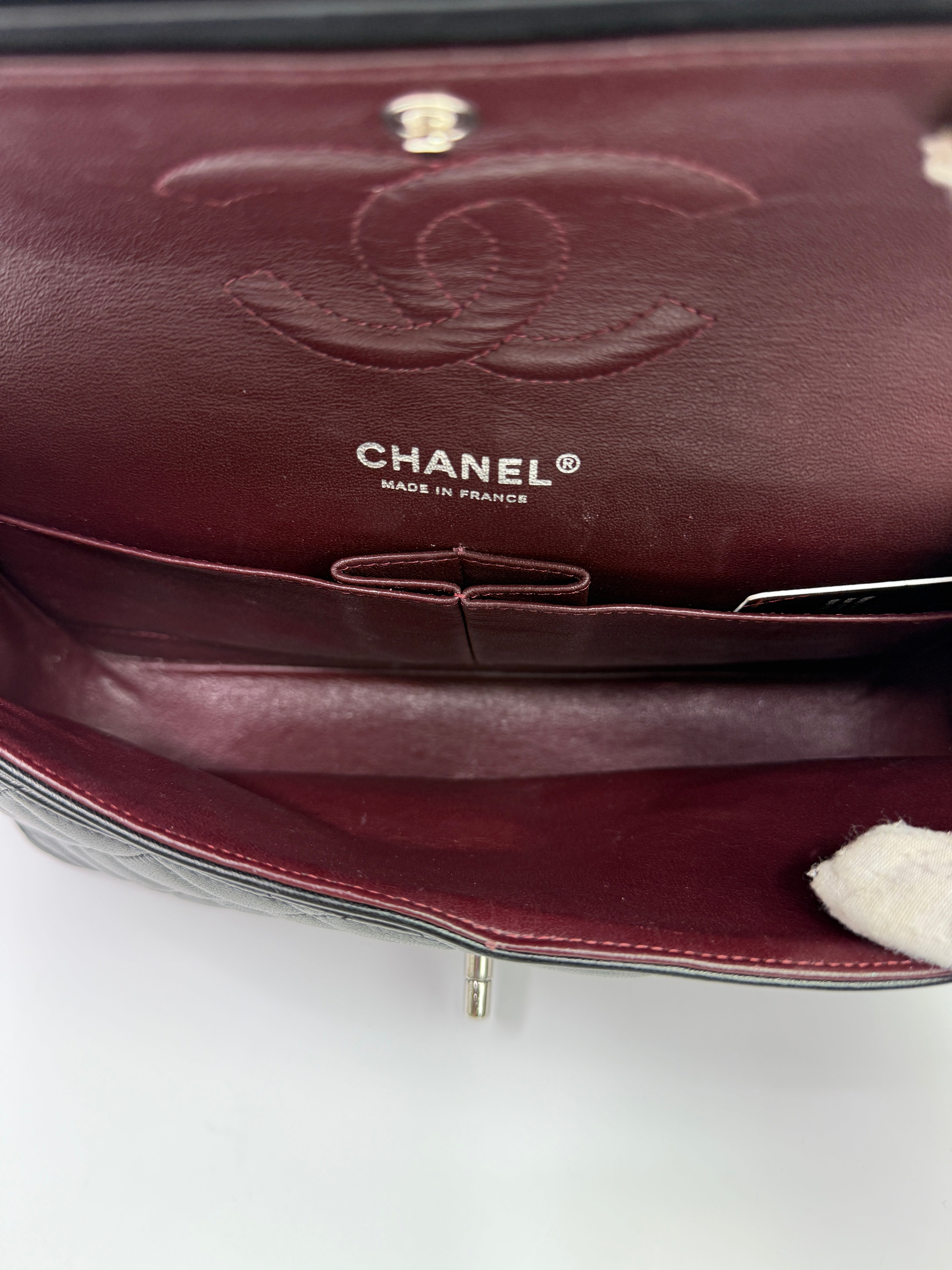 Chanel Medium Classic Double Flap Black Lambskin With Silver Hardware
Pre Loved & Authentic 