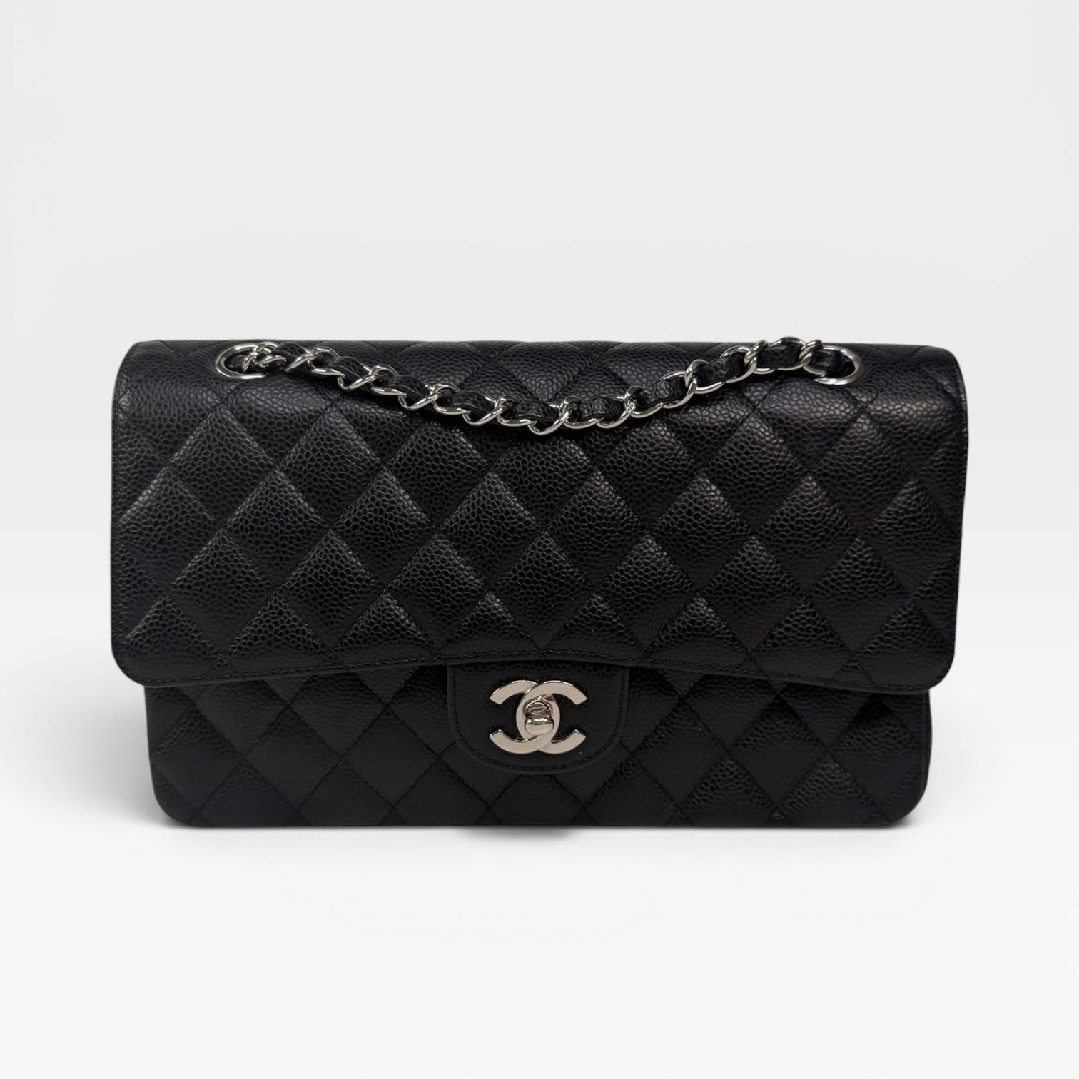 Chanel Vintage Medium Classic Double Flap Black Caviar Silver Hardware. 100% authentic and preloved in excellent condition
