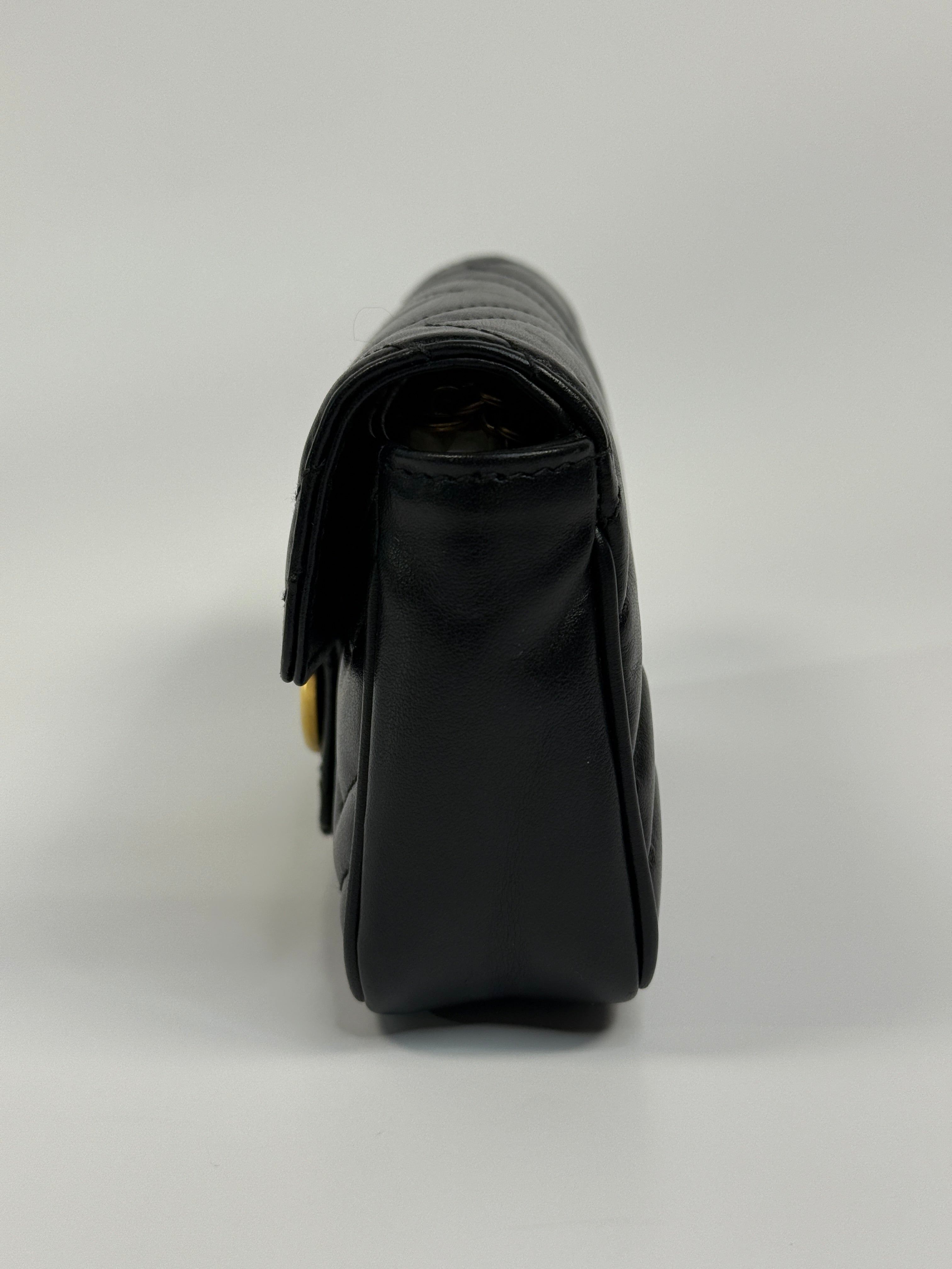 Authentic and preloved Gucci Marmont Matelassé Super Mini Bag In Black Leather With Gold Hardware in excellent condition 