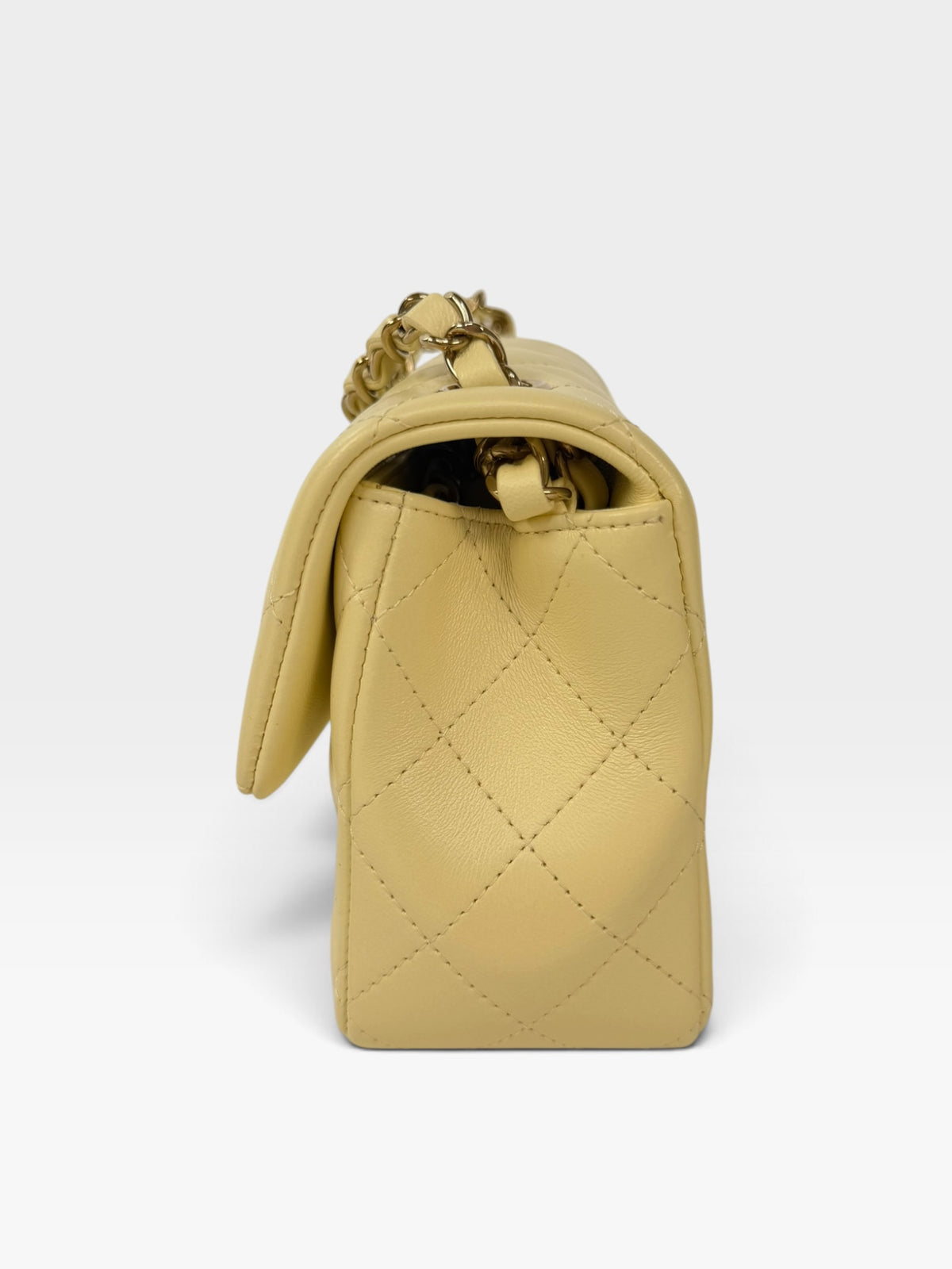 Chanel Mini Rectangle In Yellow Lambskin Leather With Gold Hardware. 100% authentic and preloved in excellent condition