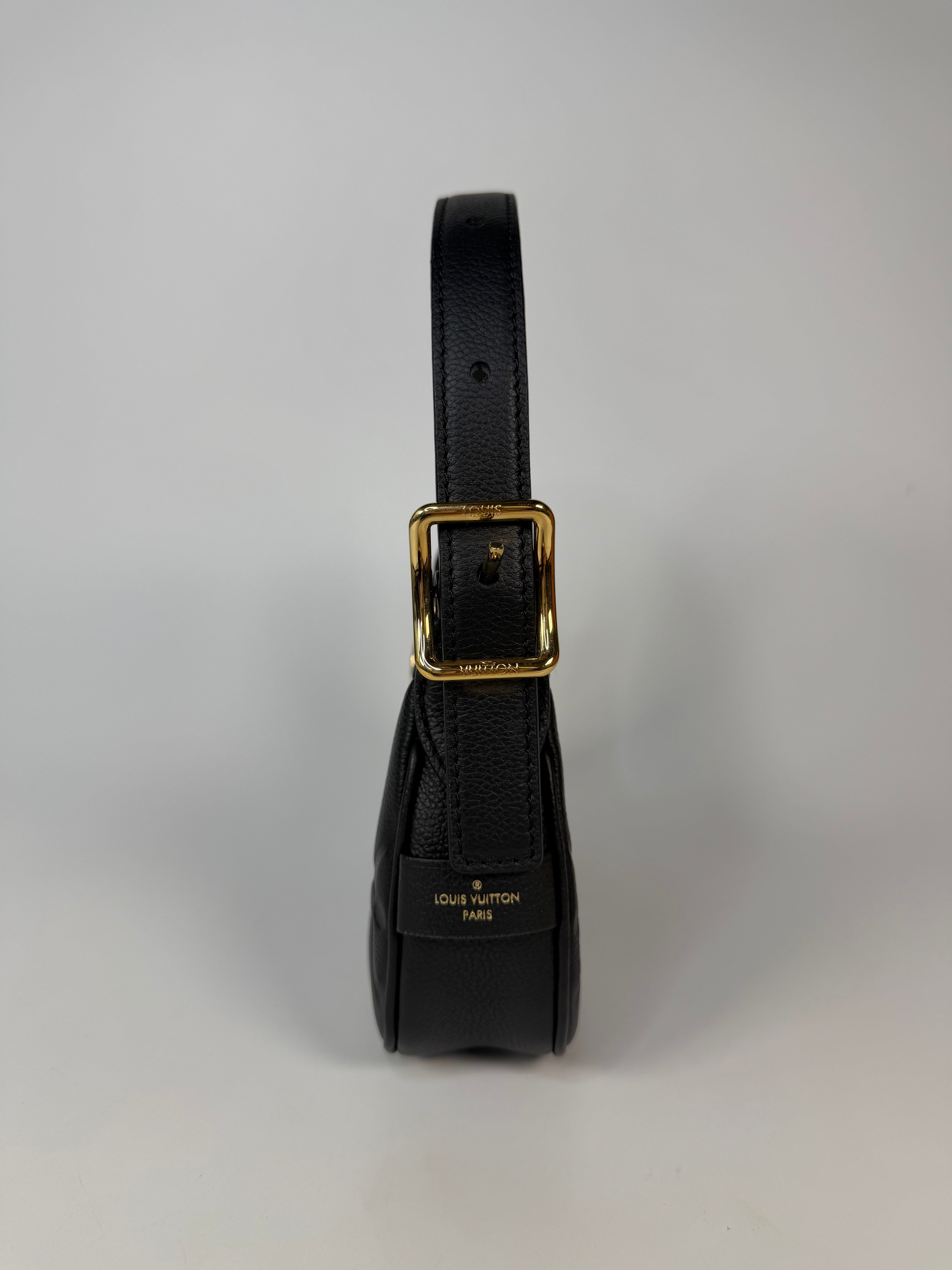 Louis Vuitton Mini Moon Bag In Black Leather With Gold Hardware in excellent condition 100% authentic and preloved